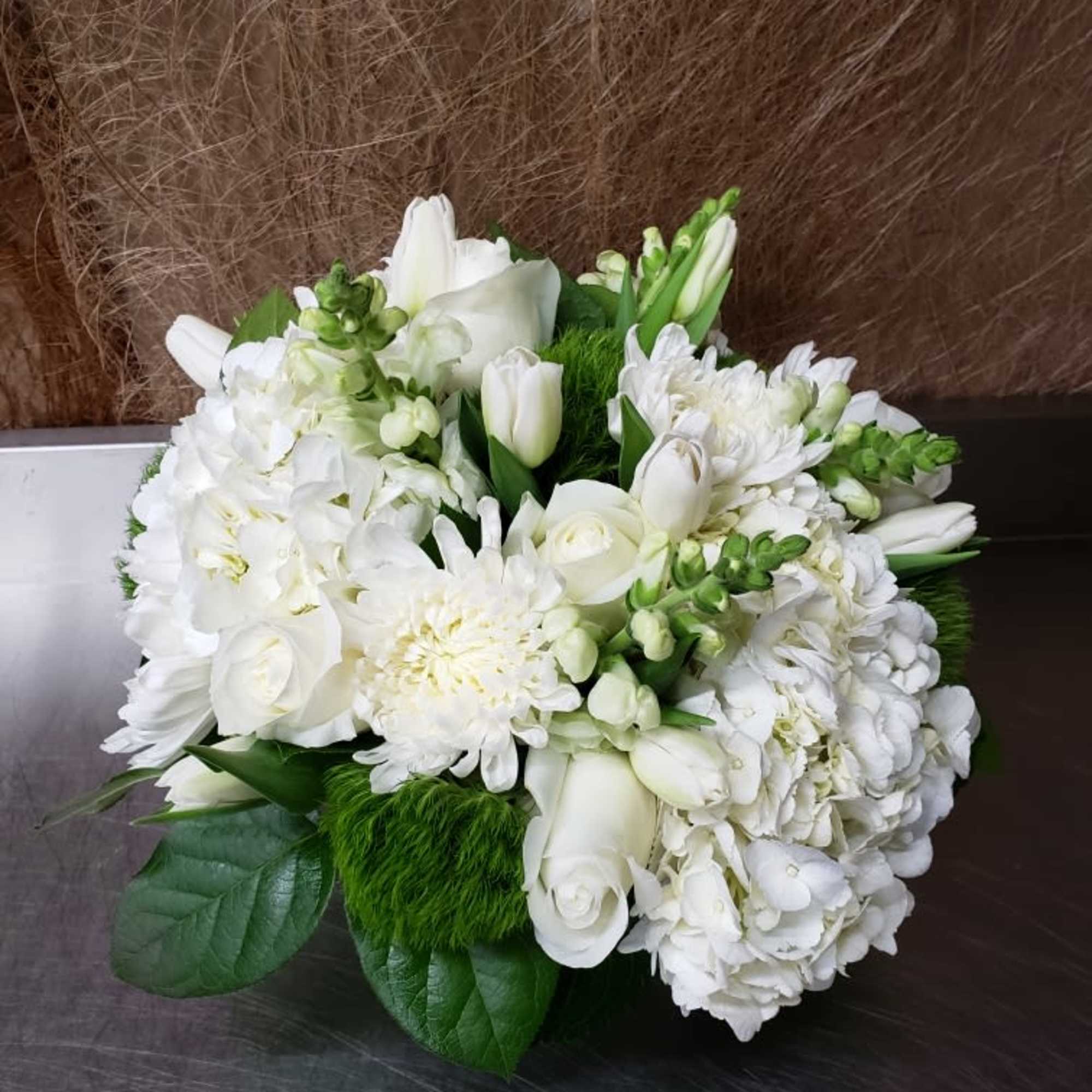 White bouquet with roses, tulips, and chrysanthemums