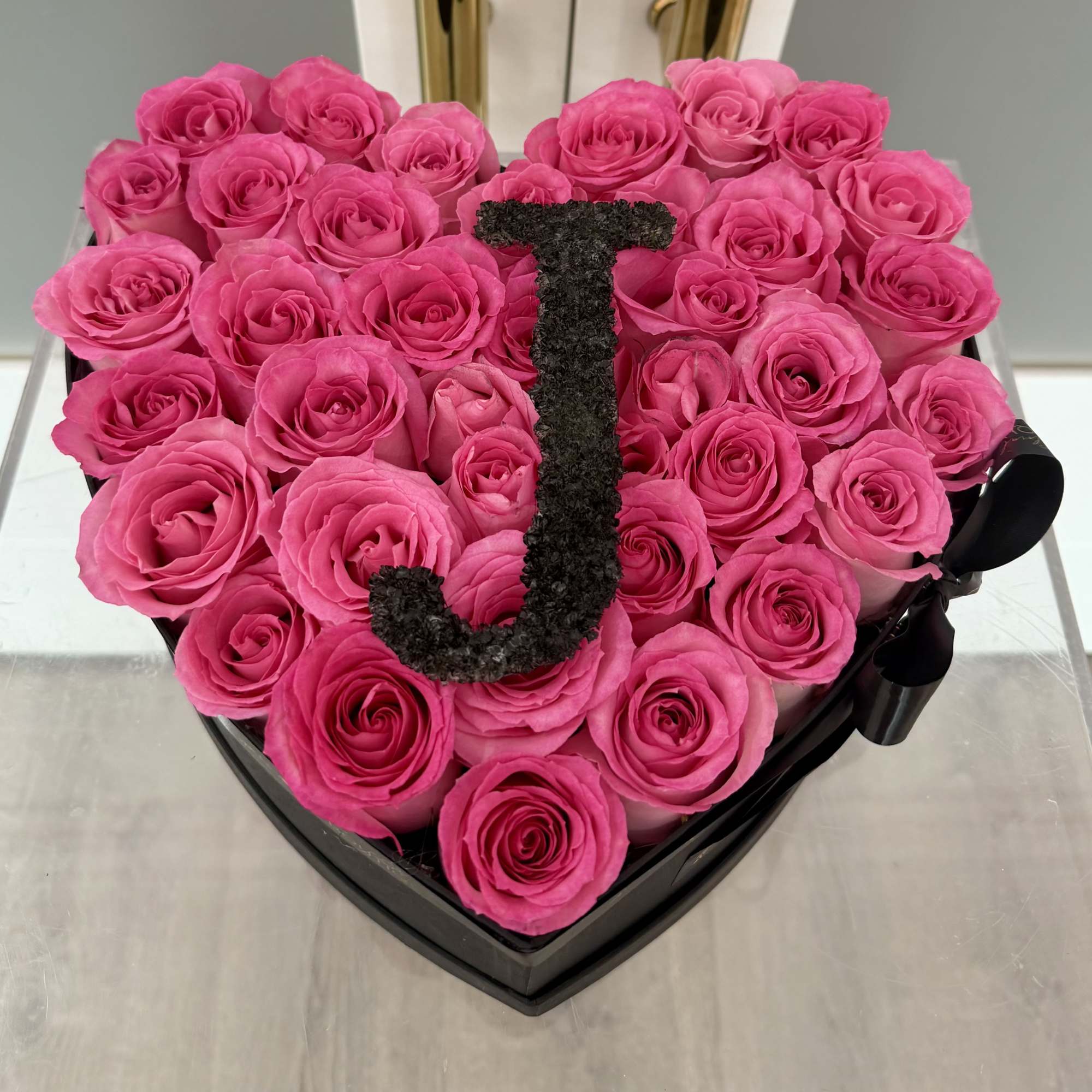 Make it personal, unforgettable, and effortlessly elegant. Our Initial Rose Heart Box
