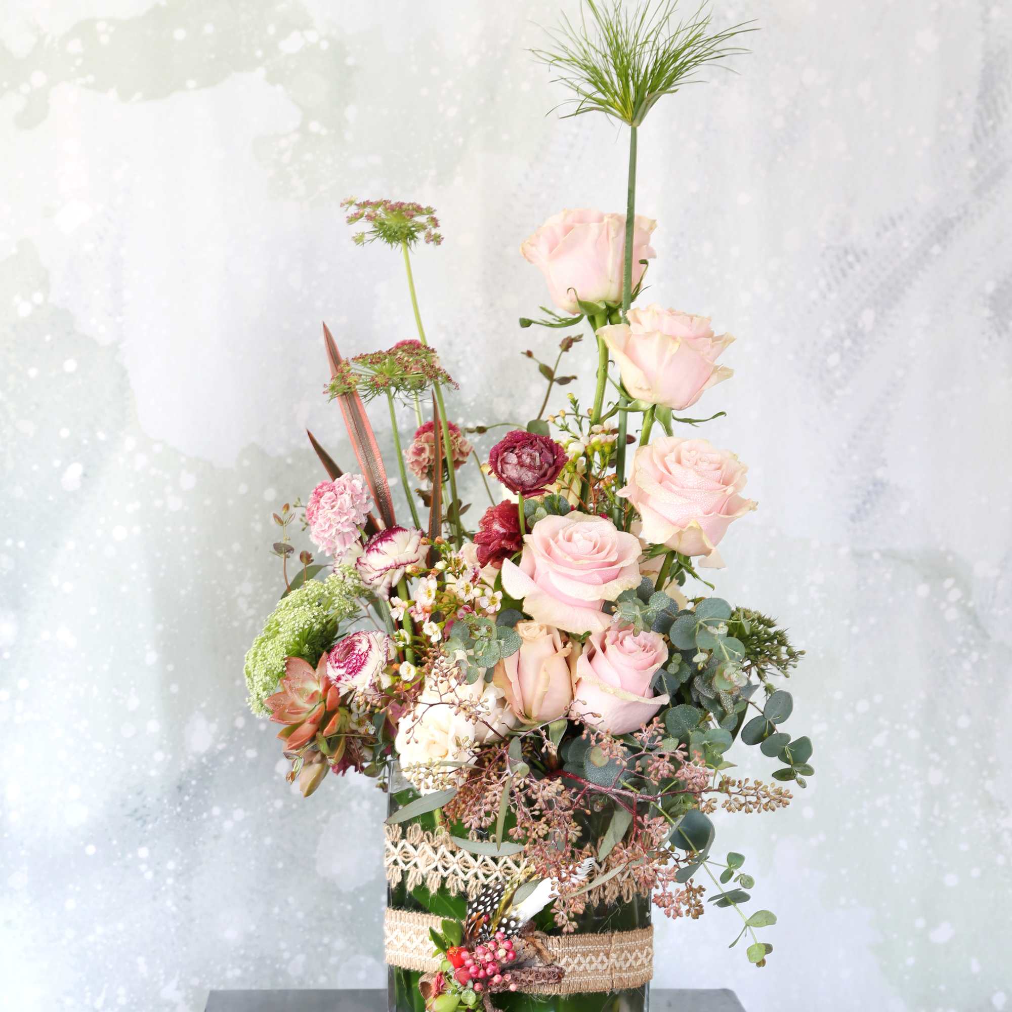 This arrangement made with a dozen different shade blush to ivory garden, photo 2 of 5