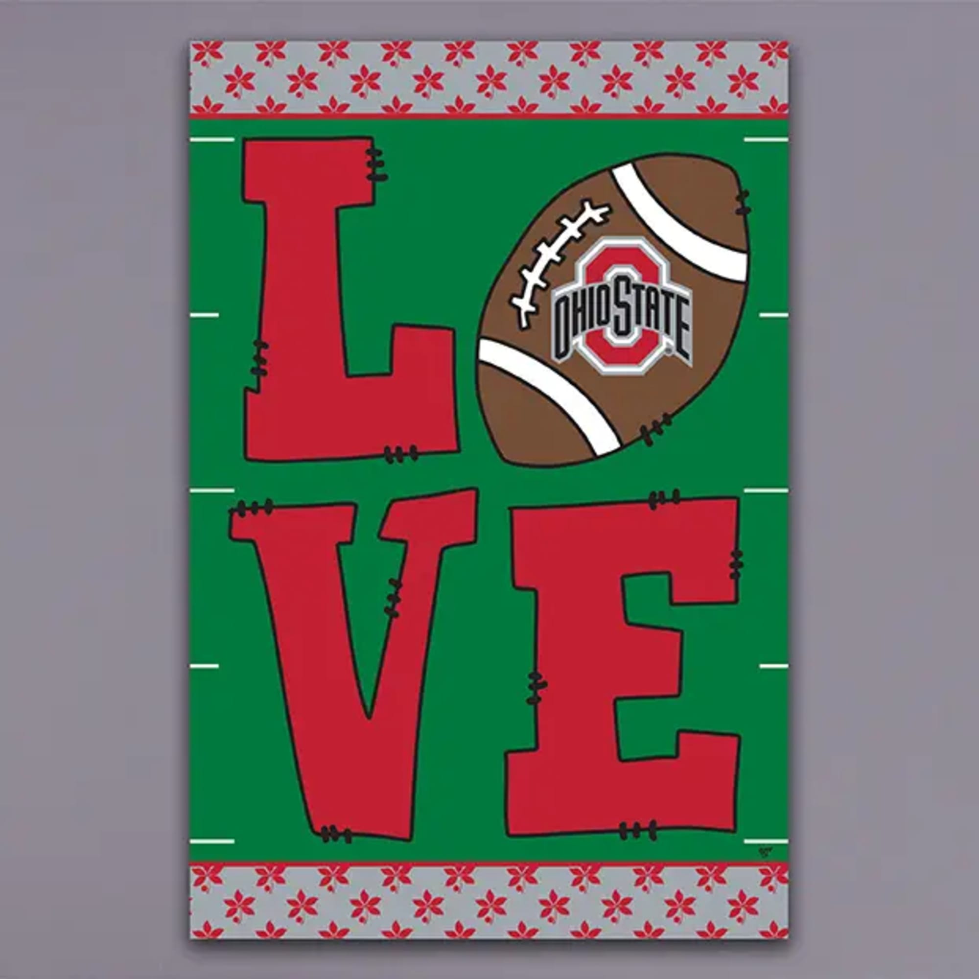 Ohio State football-themed sign with the word LOVE