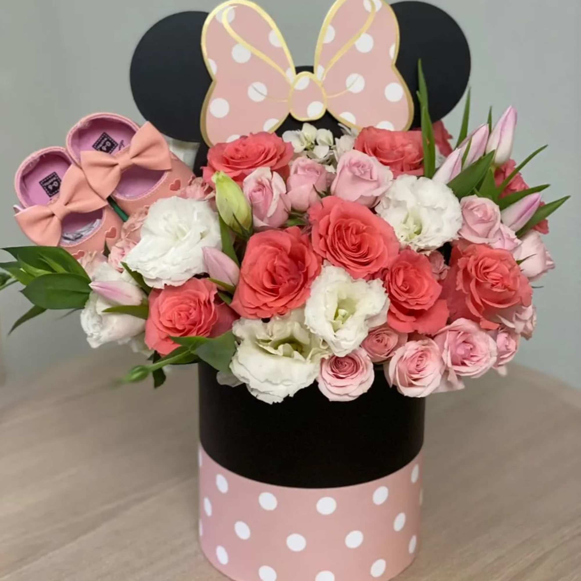 Pink and white rose bouquet in a polka-dot hat box with Minnie Mouse ears