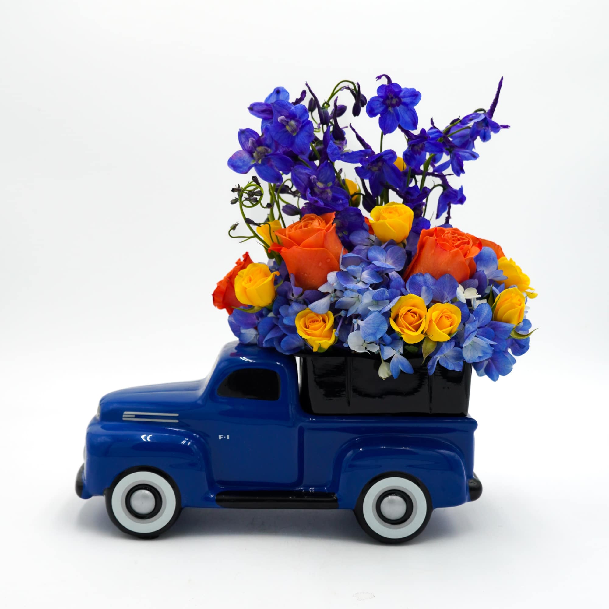 Includes Blue Hydgreans, Orange Roses, Yellow Spray Roses, and Delphinium Blue, photo 2 of 2