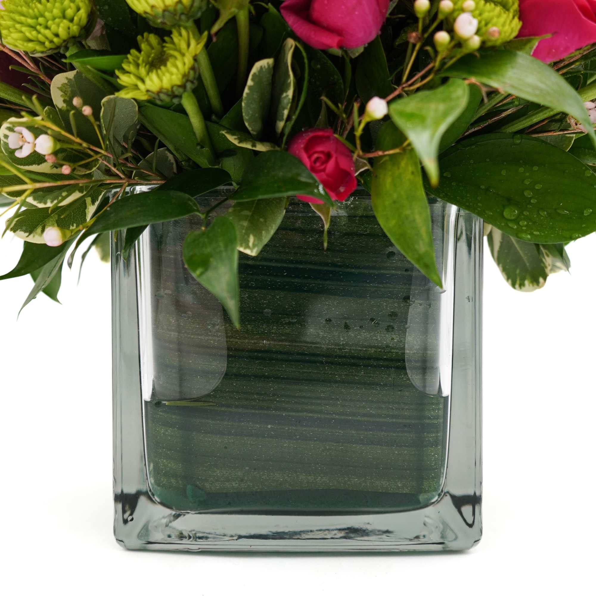 Bright clusters of pink roses and white lilies create a lush, romantic, photo 3 of 3