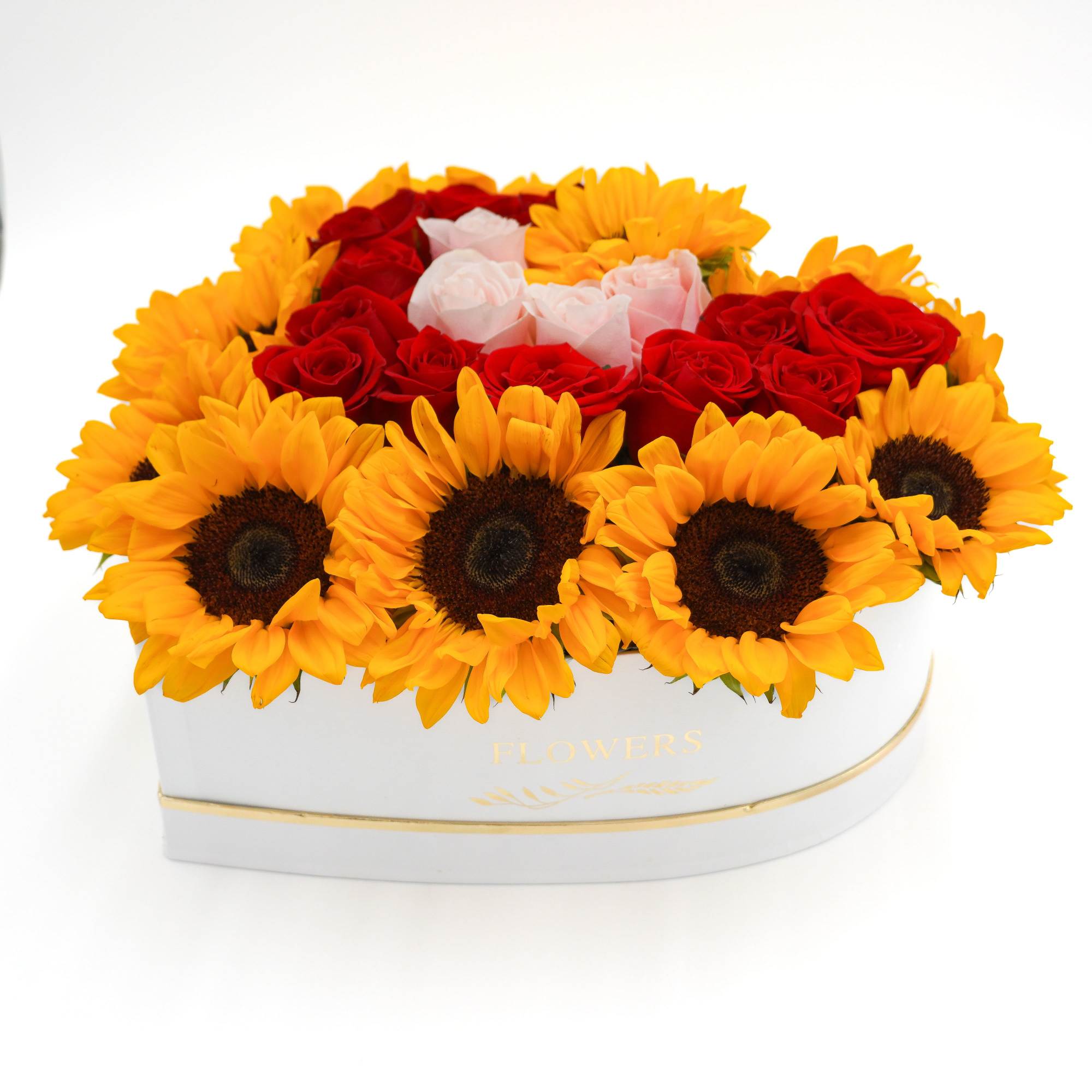 Heart-shaped box arrangement of sunflowers and red and pink roses