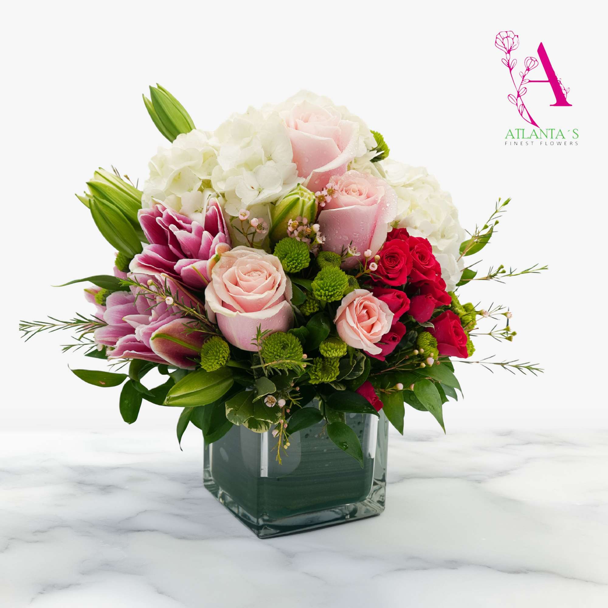 Bright clusters of pink roses and white lilies create a lush, romantic, photo 2 of 3