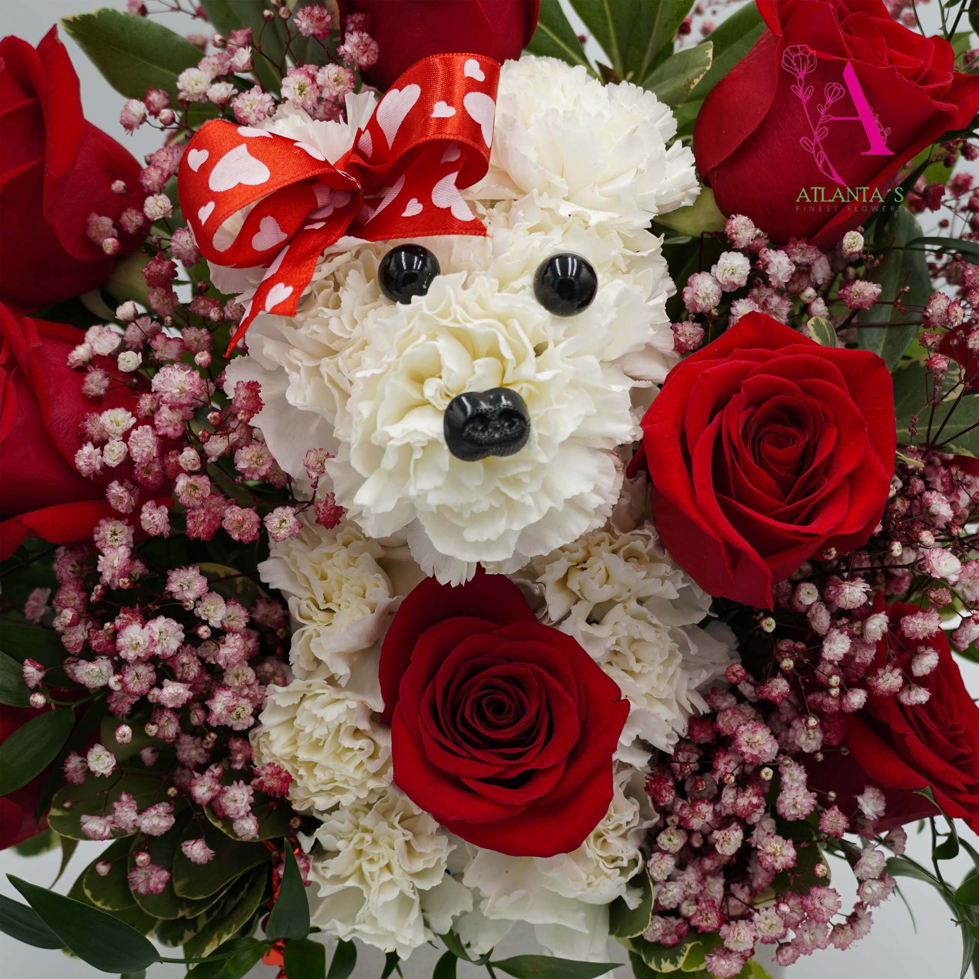 Includes Red Roses, Carnations, baby breaths, and mixed greenery 

Square Plush Box, photo 2 of 2