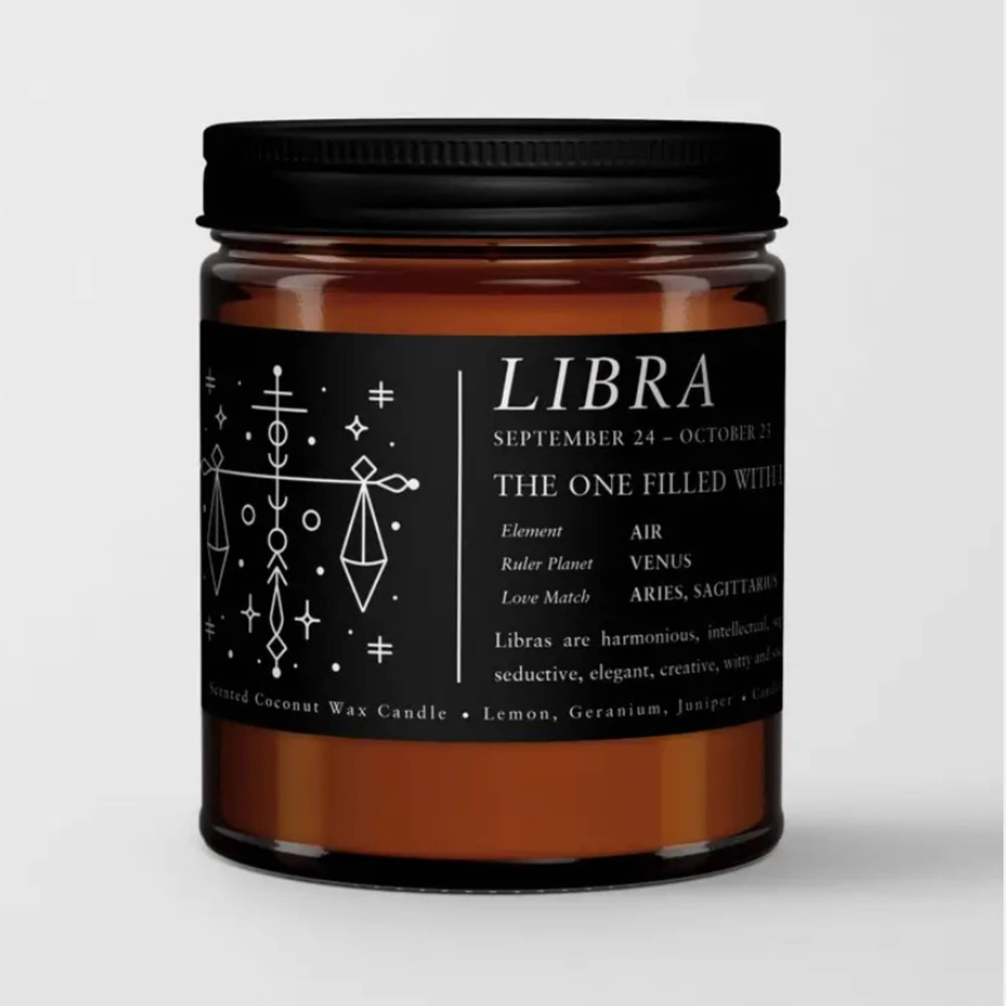 Amber candle in a black-lidded jar with a Libra label