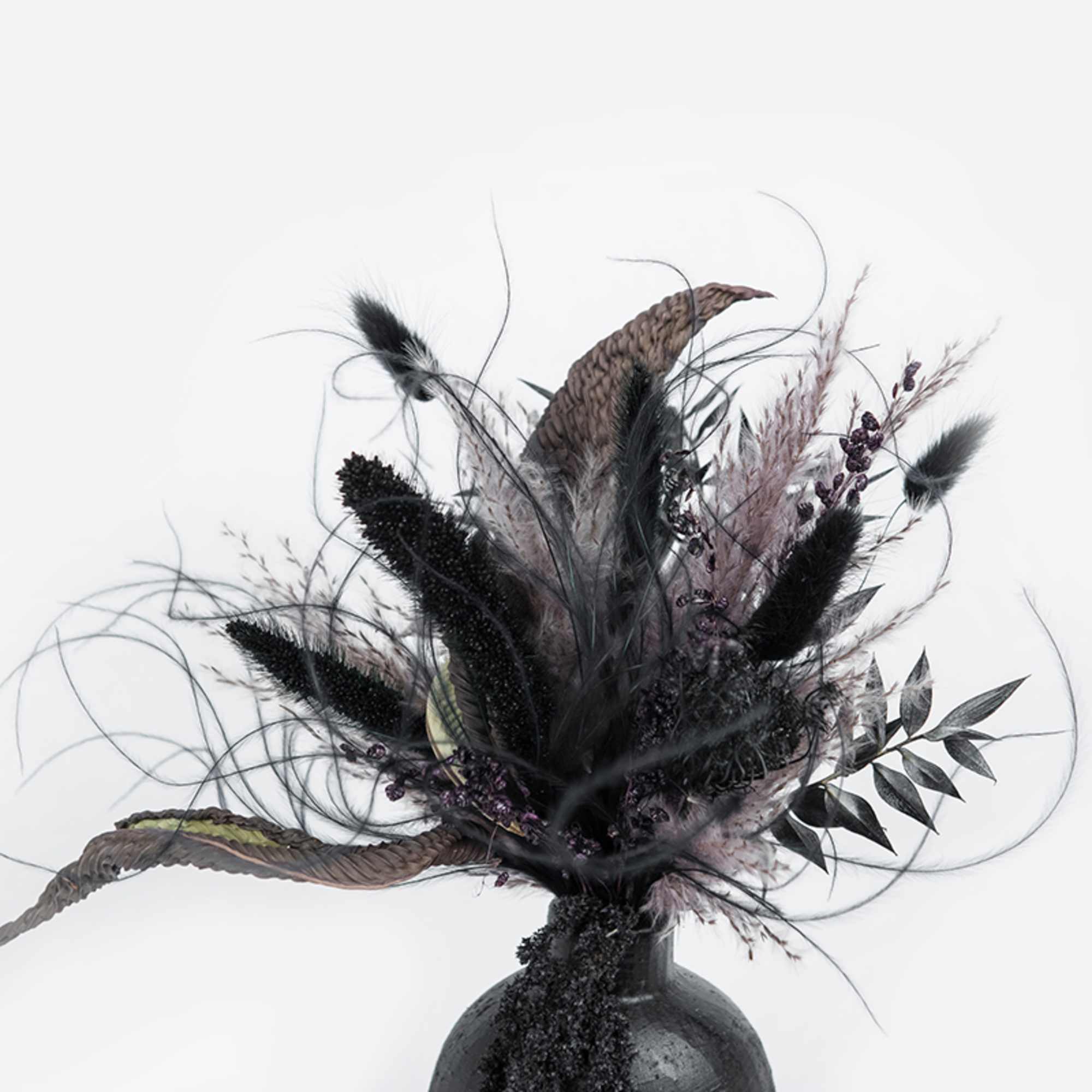 Dark dried floral arrangement in a black vase, photo 2 of 4