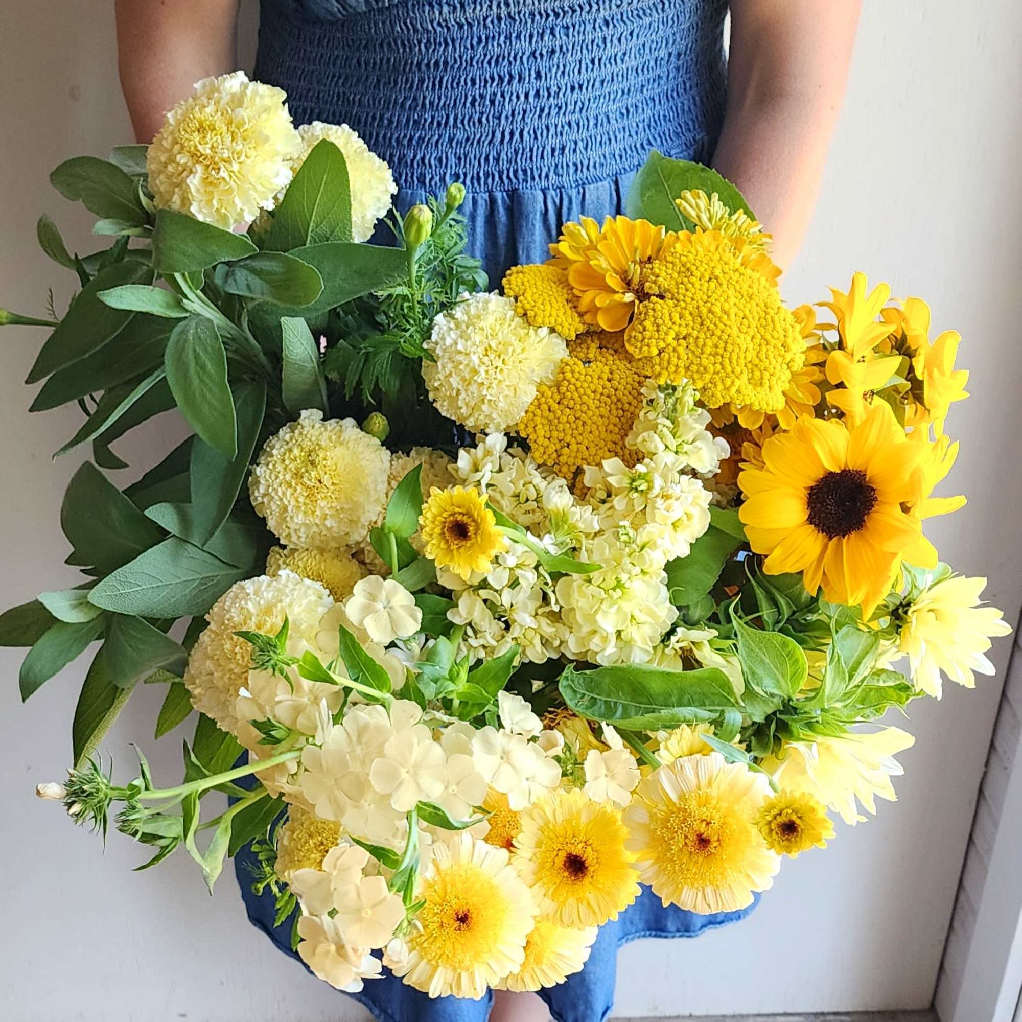 A bright, cheerful burst of golden sunflowers that brings pure joy to