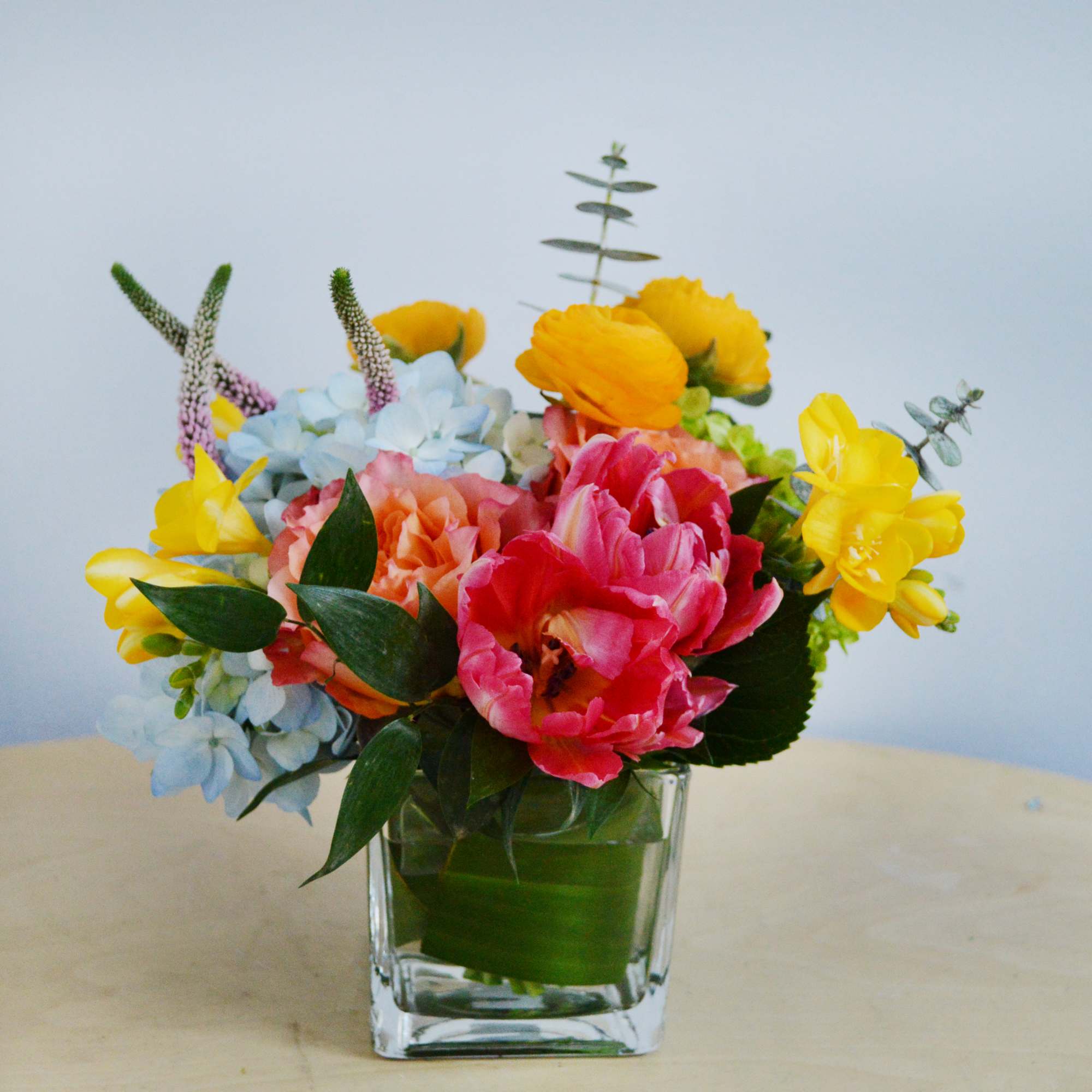 We&rsquo;ve combined our most colorful flowers designed to brighten any day!
This vase