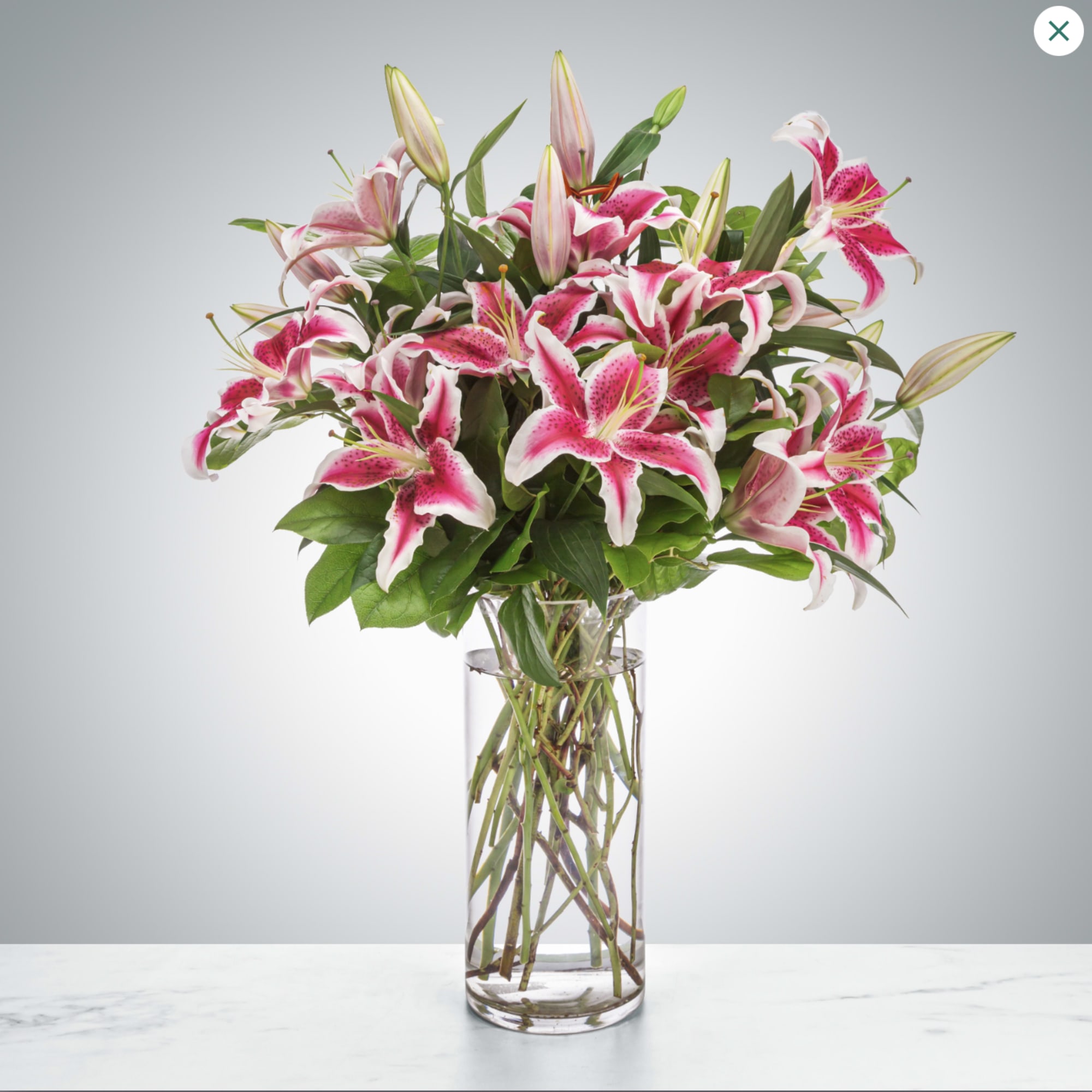 Pink lilies stand for love, admiration, compassion, and femininity. Send this sweet-smelling