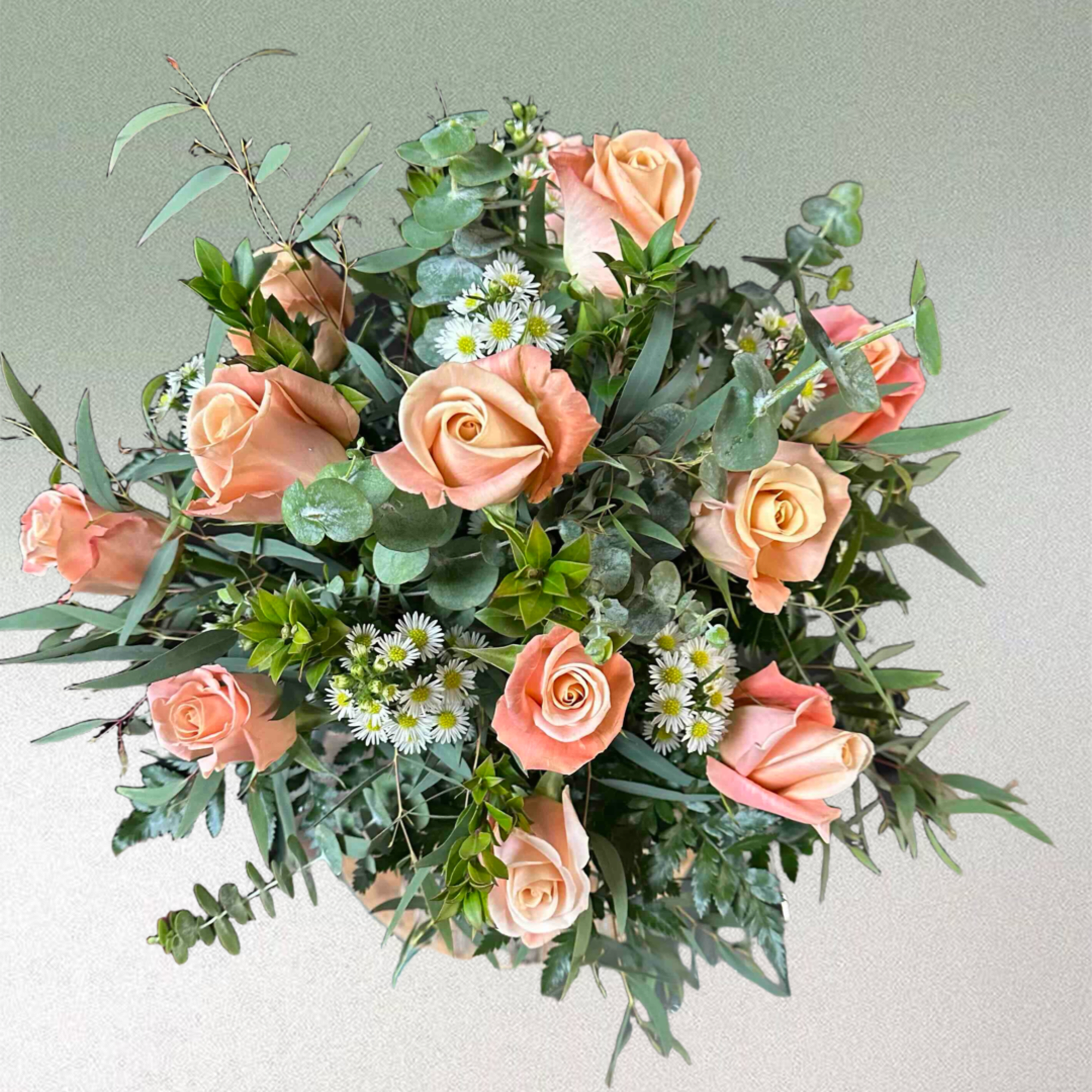A dozen gorgeous peach roses arranged in a vase., photo 2 of 2