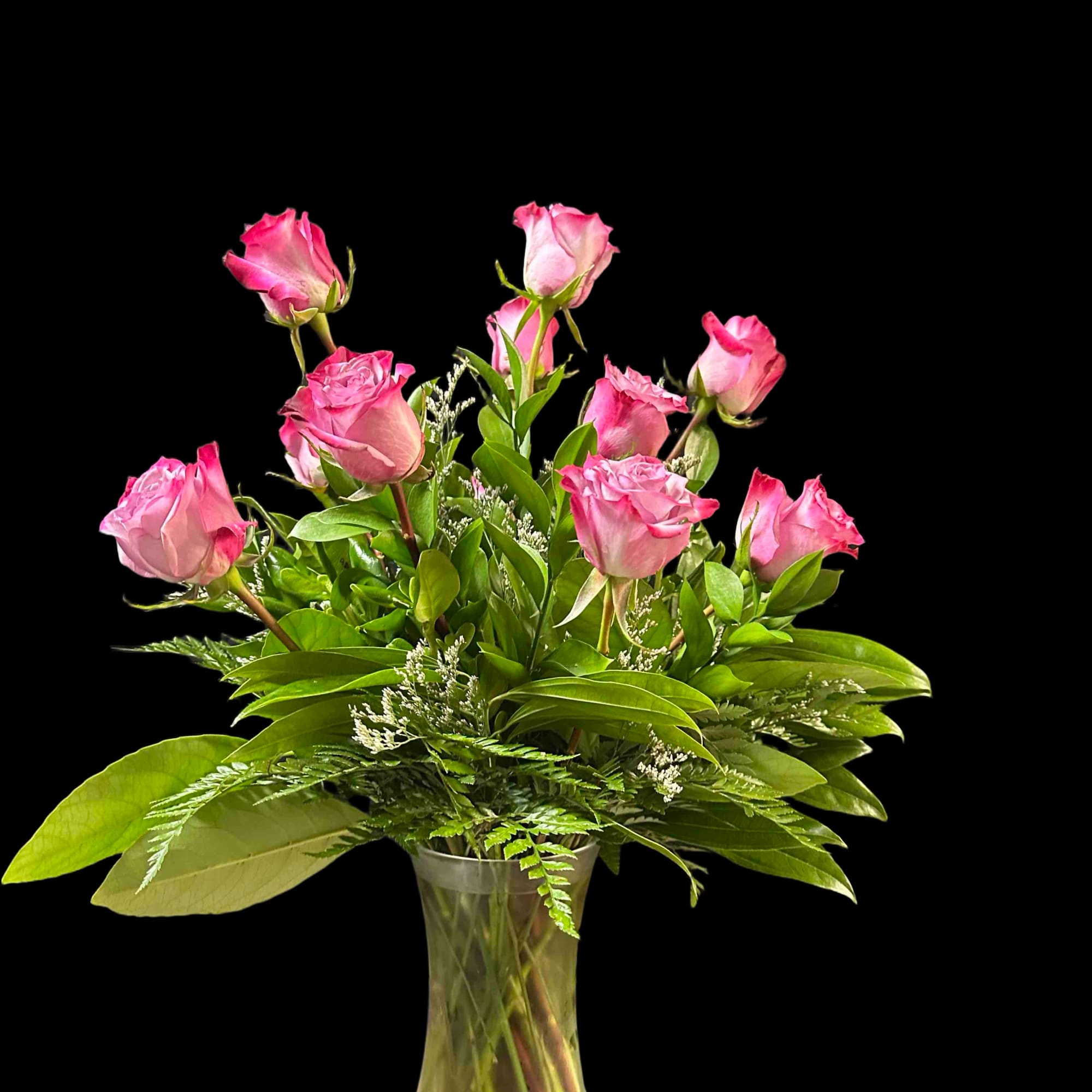 A dozen lavendar roses arranged in a vase., photo 2 of 3