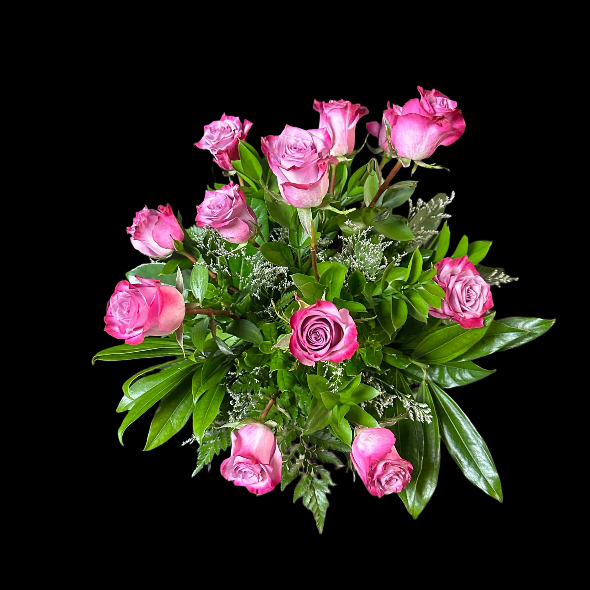 A dozen lavendar roses arranged in a vase., photo 3 of 3