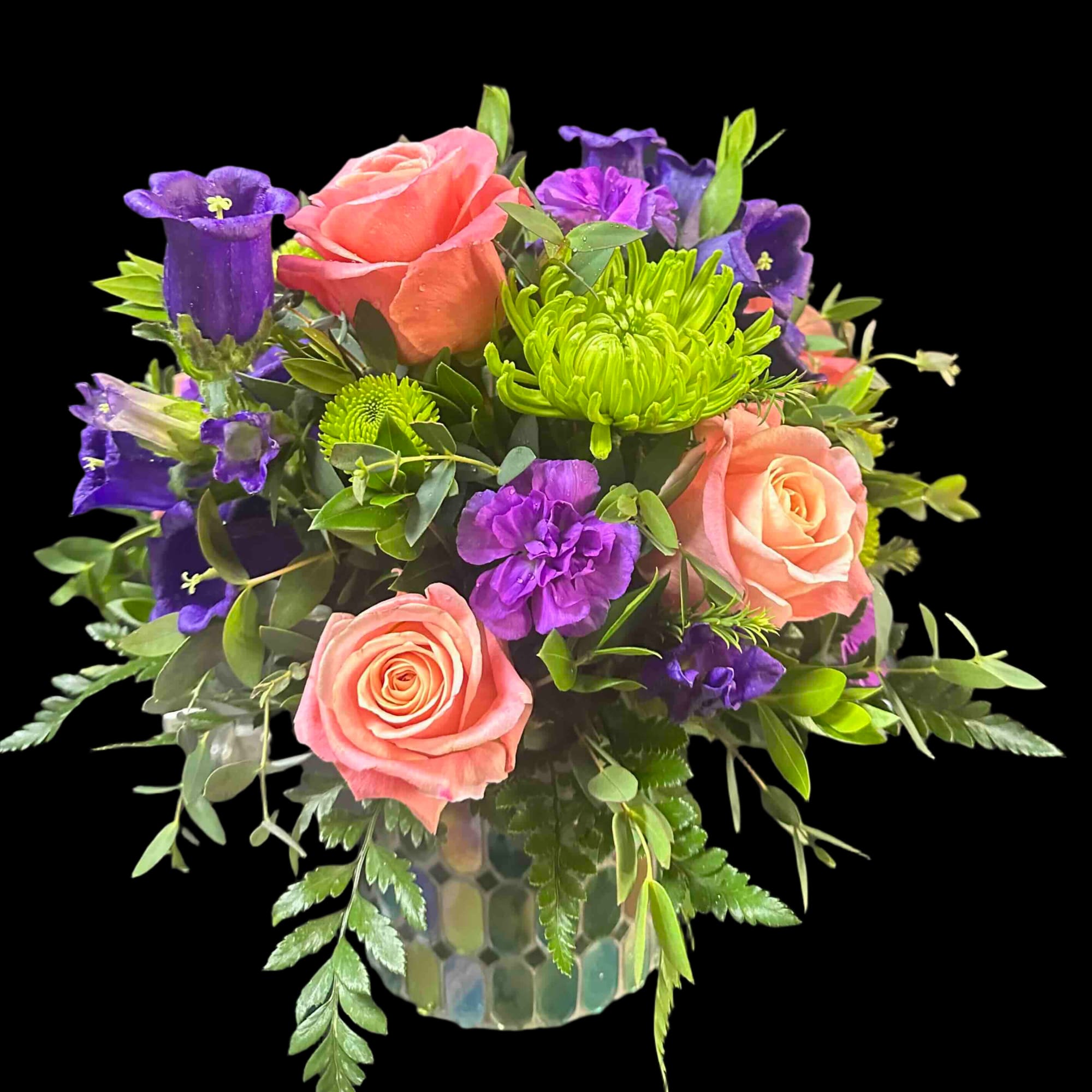 Pink, purple, and green flowers in a mosaic vase.