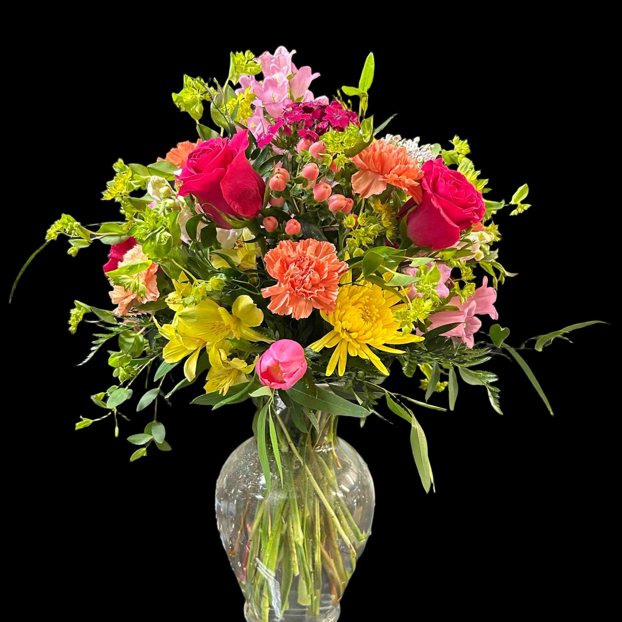 Stunning display of color using roses, carnations, alstromeria, and more