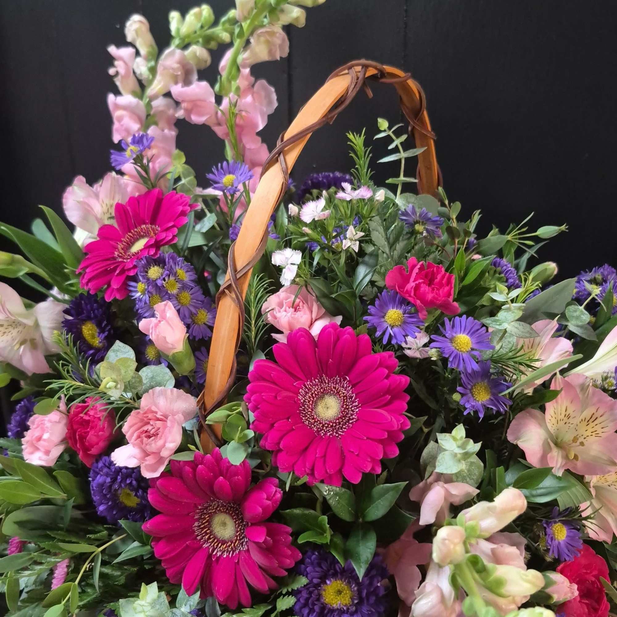 Basket with gerber daisies, snapdragons, carnations and asters, photo 2 of 2
