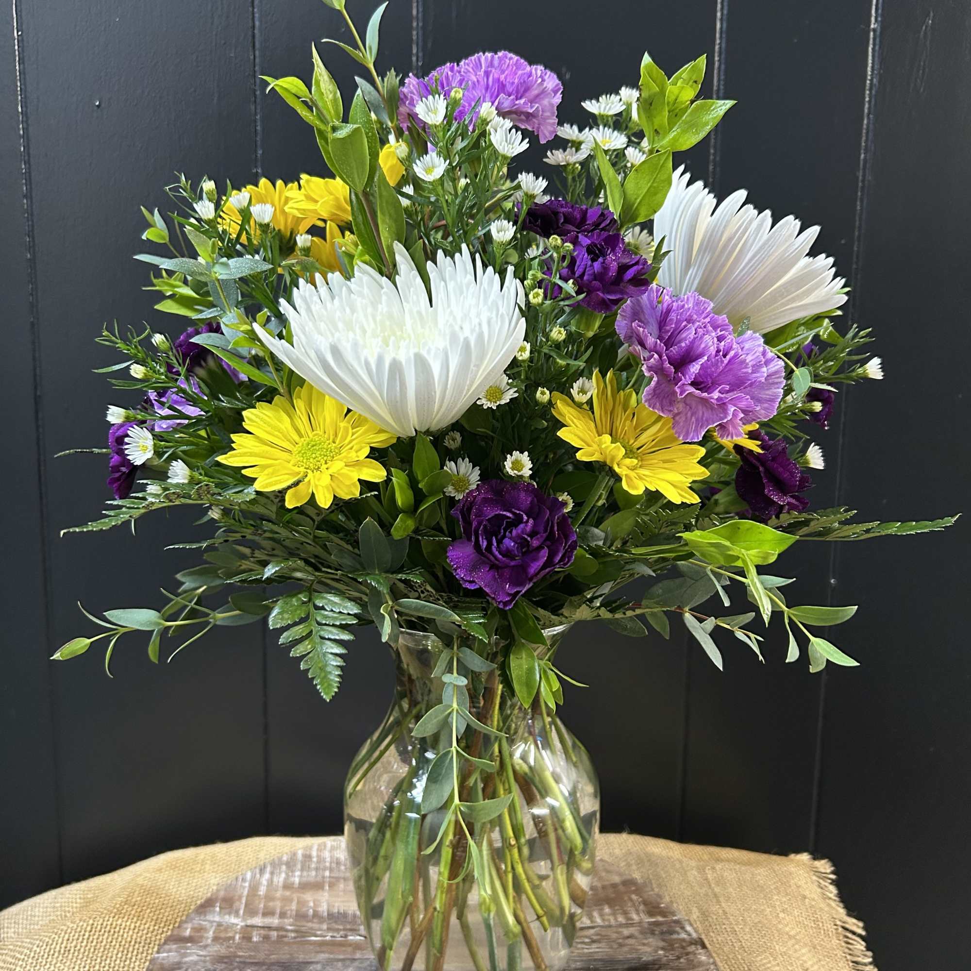 Fun mix of purple, yellow, and white flowers, photo 2 of 2