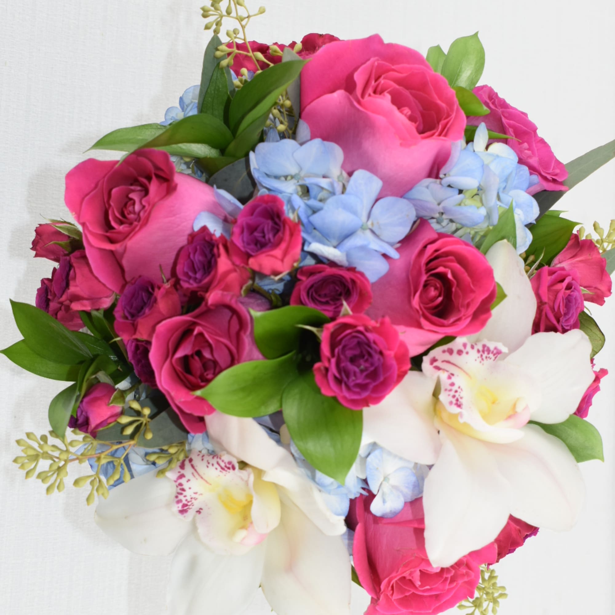Nice cylinder vase with some beautiful blue hydrangeas and some fresh pink, photo 3 of 3
