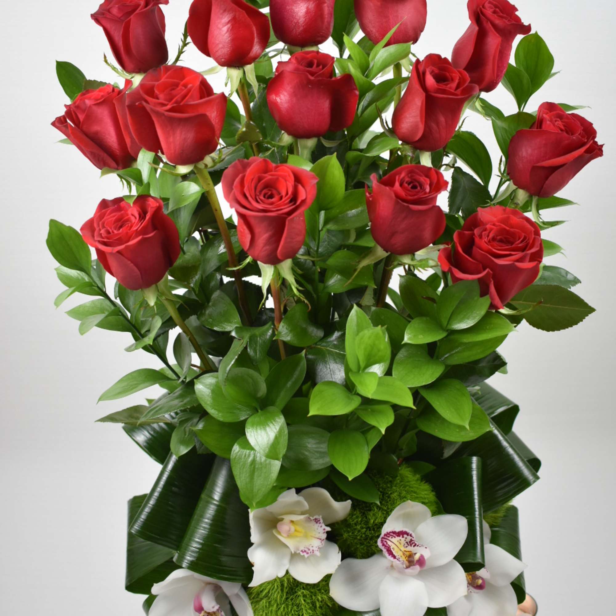 This Beautiful arrangement is in a ceramic vase with Ecuadorian red roses, photo 3 of 3