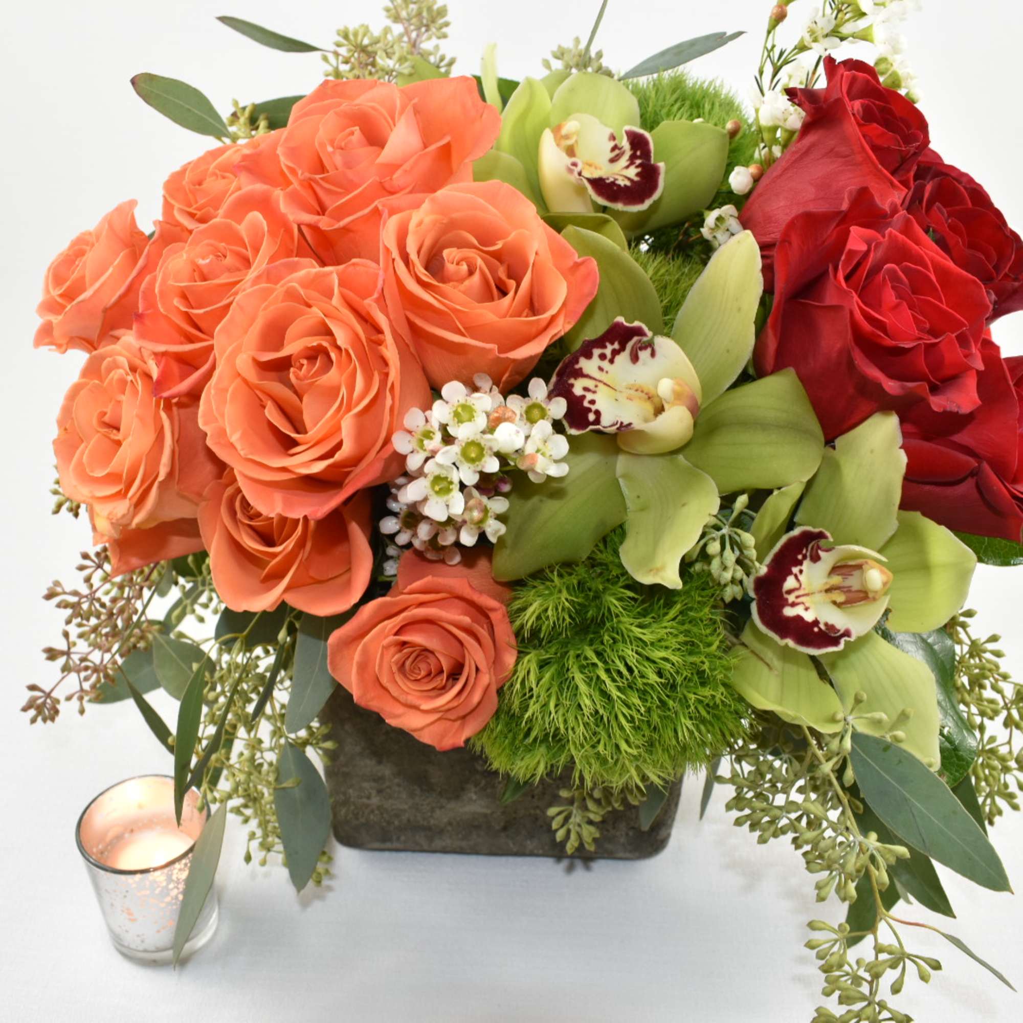 This arrangement comes in a square rustic vase
with Ecuadorian roses in the, photo 2 of 3