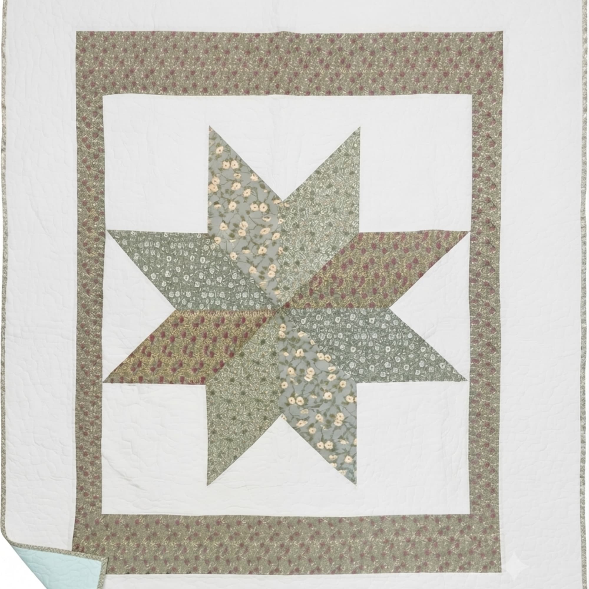 Patchwork quilt with a star pattern in muted floral fabrics