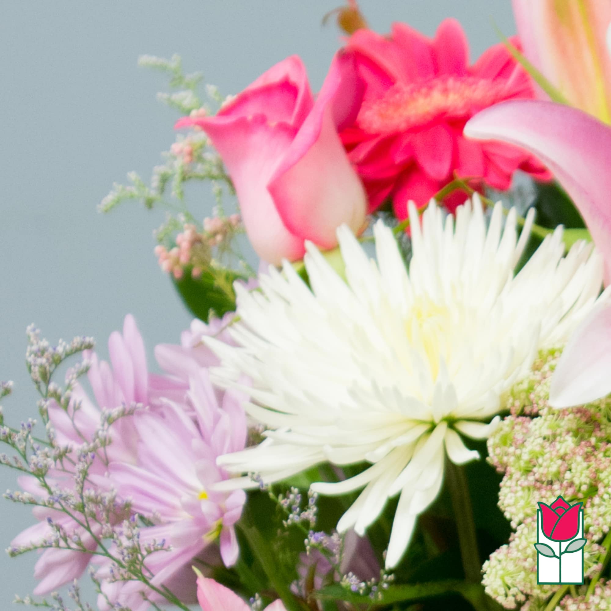 Pink and white mixed bouquet with a gerbera daisy and calla lilies