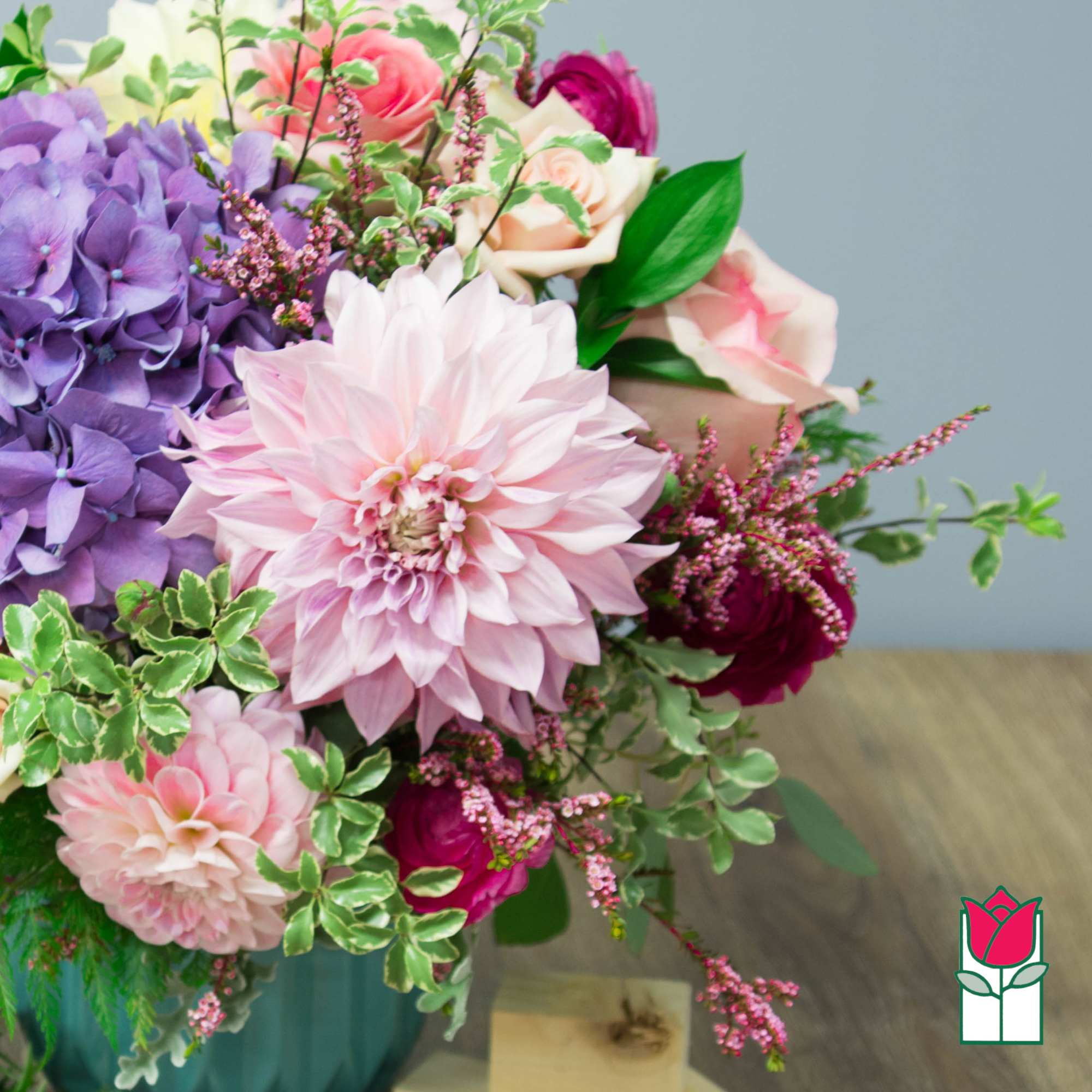 Bouquet of pink, purple, and white flowers in a vase