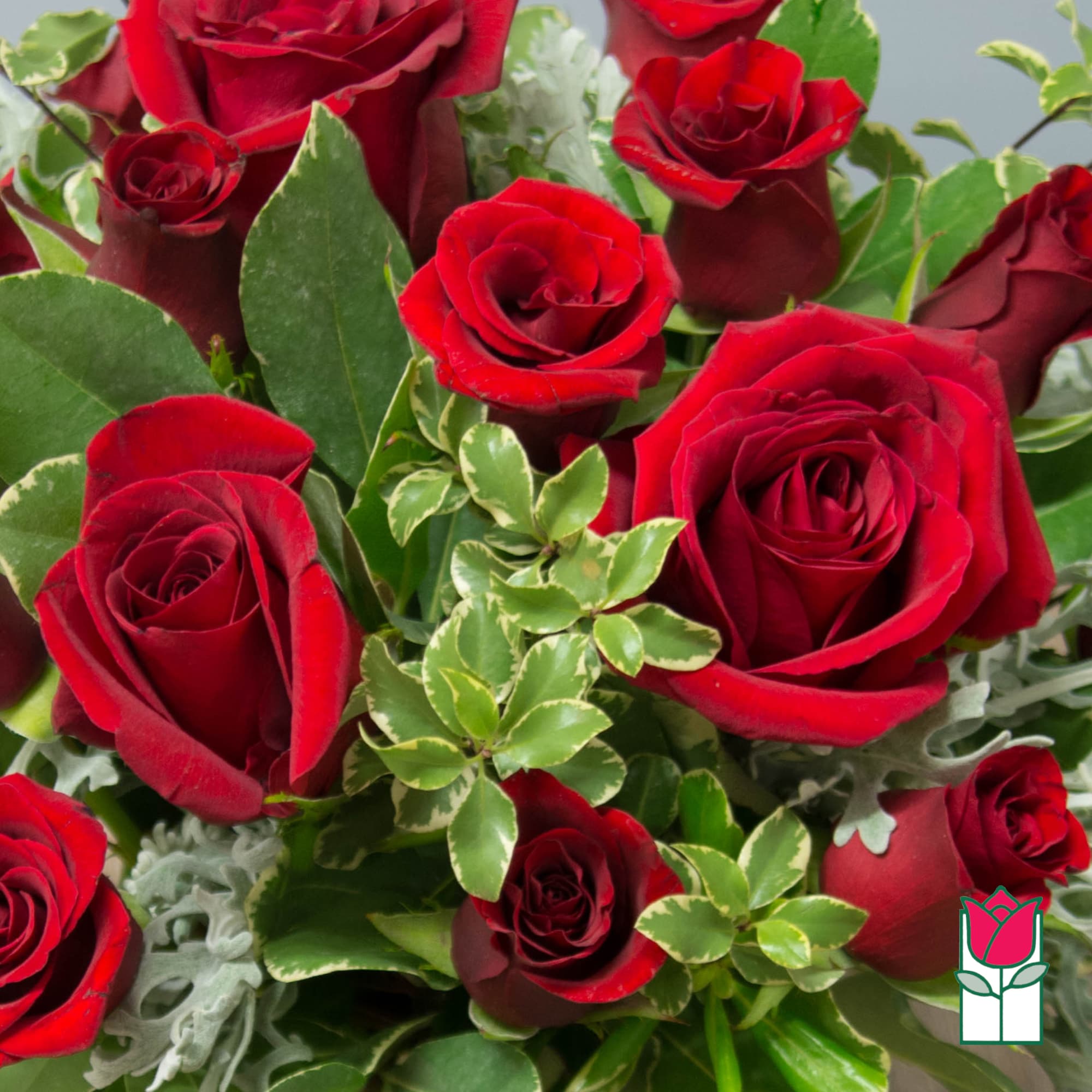 Bouquet of red roses with variegated greenery, photo 3 of 4