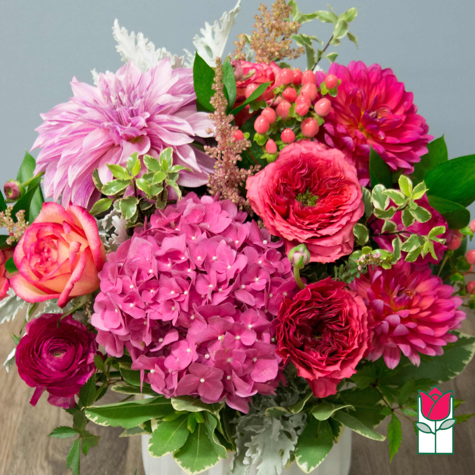 Pink and magenta mixed bouquet in a vase
