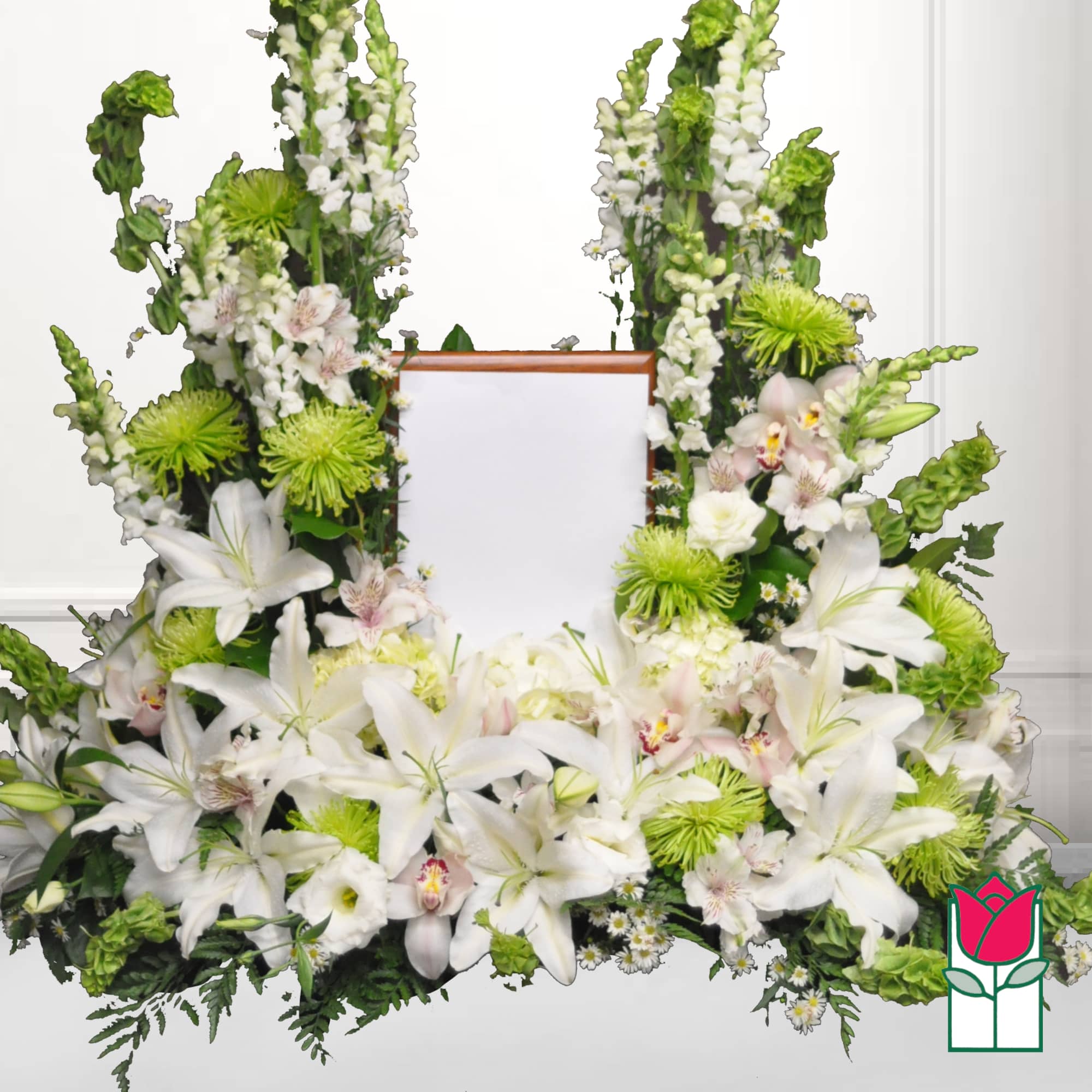 White floral standing spray with lilies and green accents