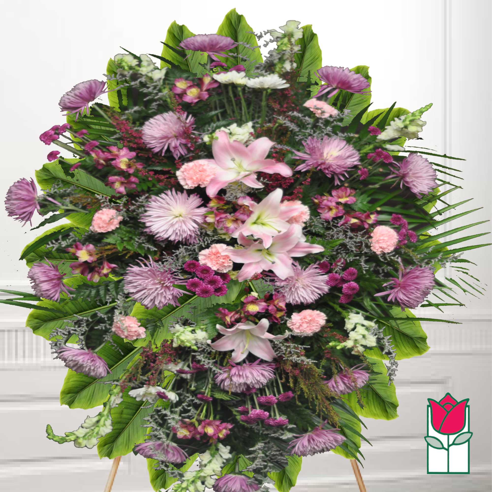 Large standing floral spray with pink lilies and purple chrysanthemums