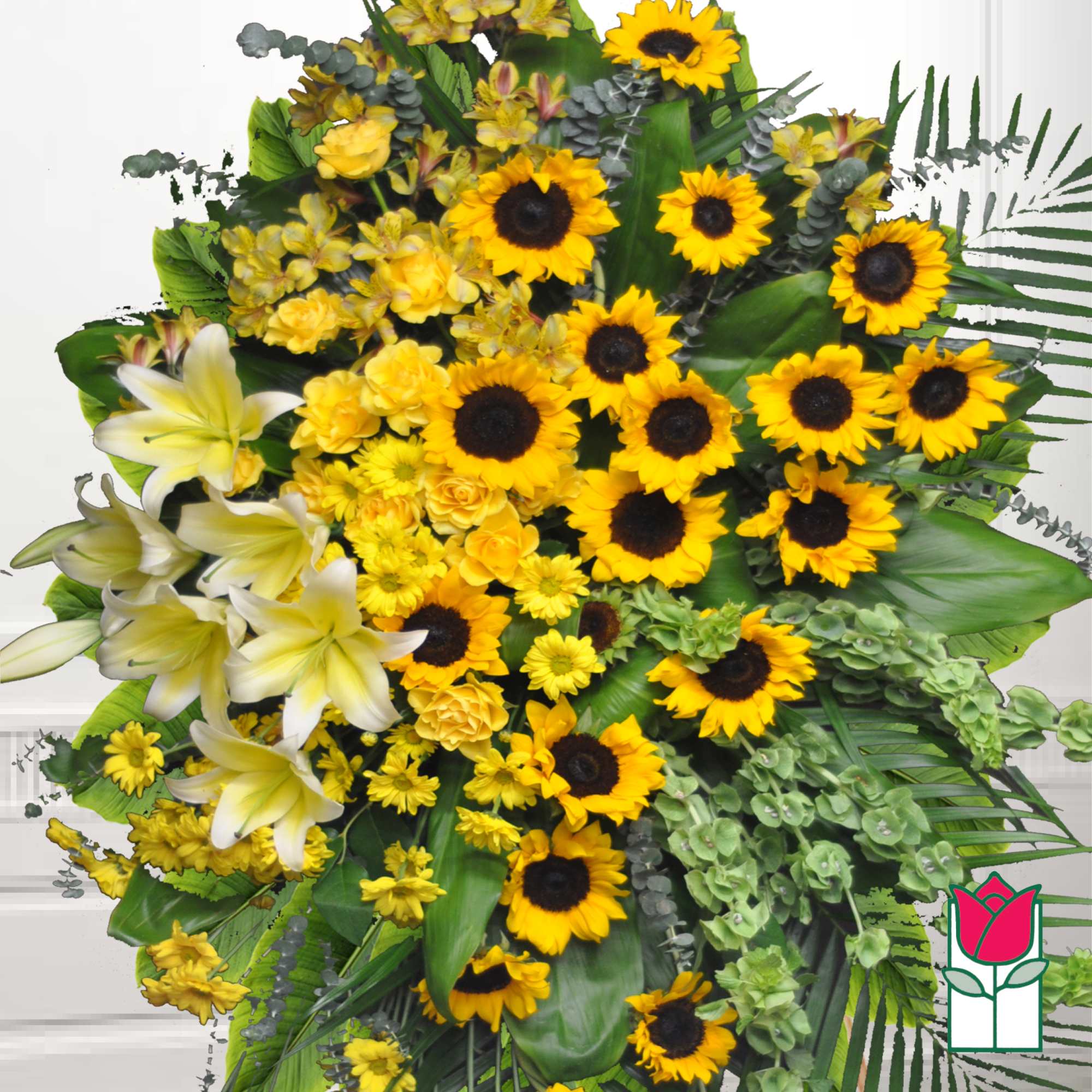 Bouquet of yellow sunflowers and white lilies with lush greenery