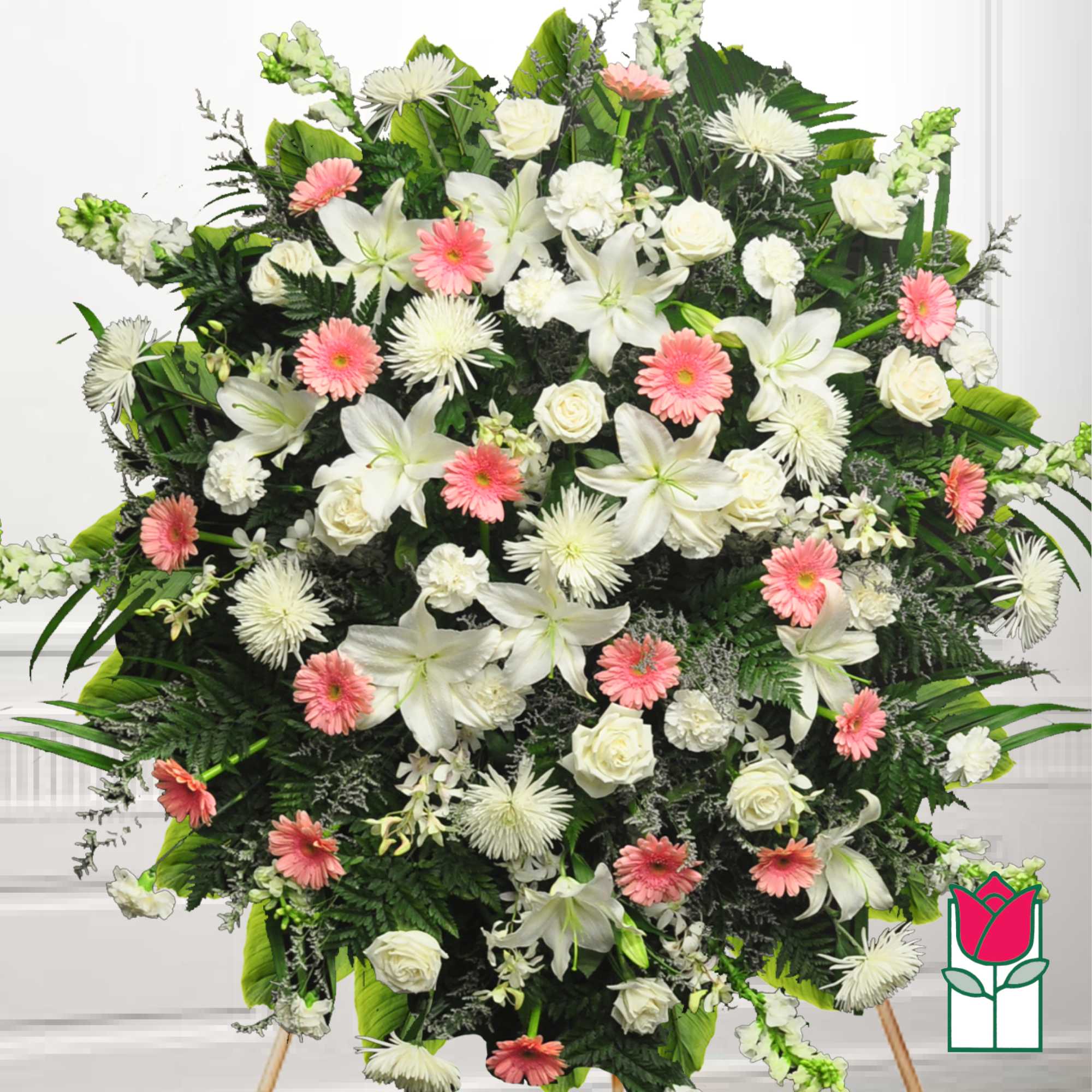 Large standing spray of white lilies, roses, and pink daisies