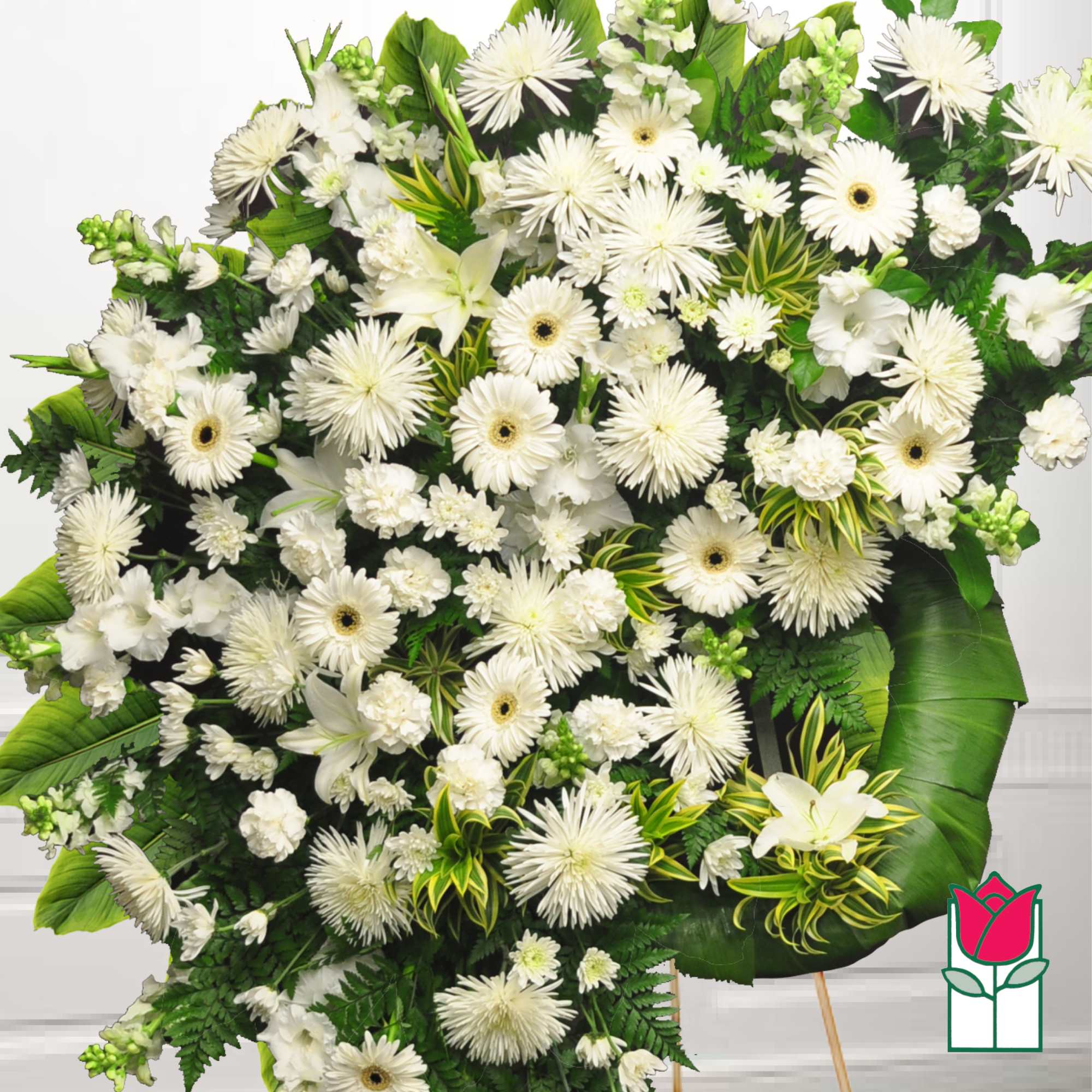 Large white funeral spray with gerbera daisies and lilies