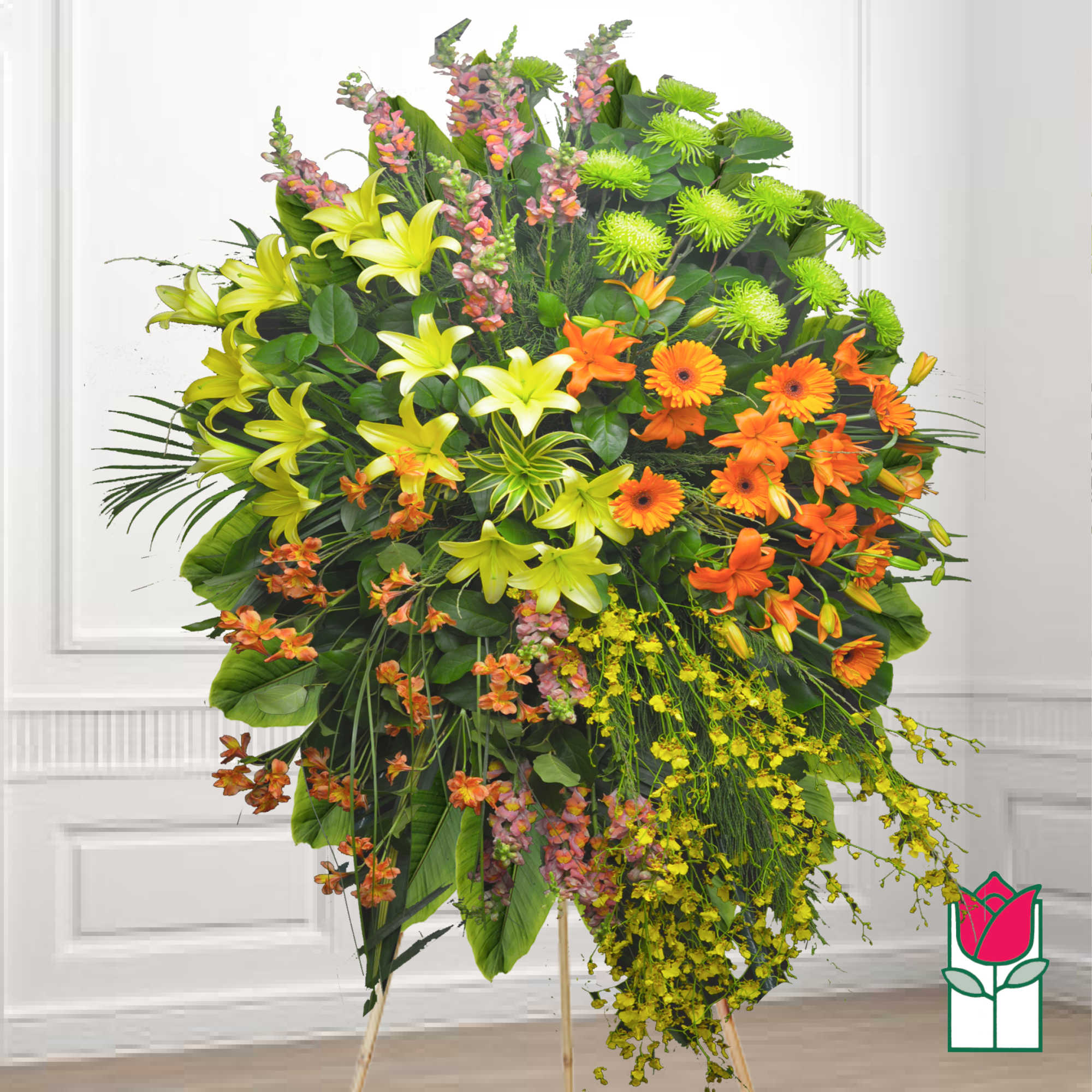 Large standing floral spray with lilies, gerbera daisies, and orchids