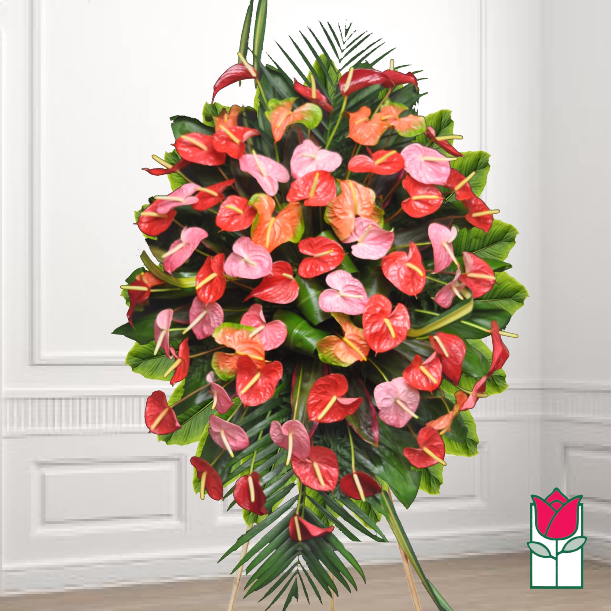 Standing floral spray with red, pink, and orange anthuriums