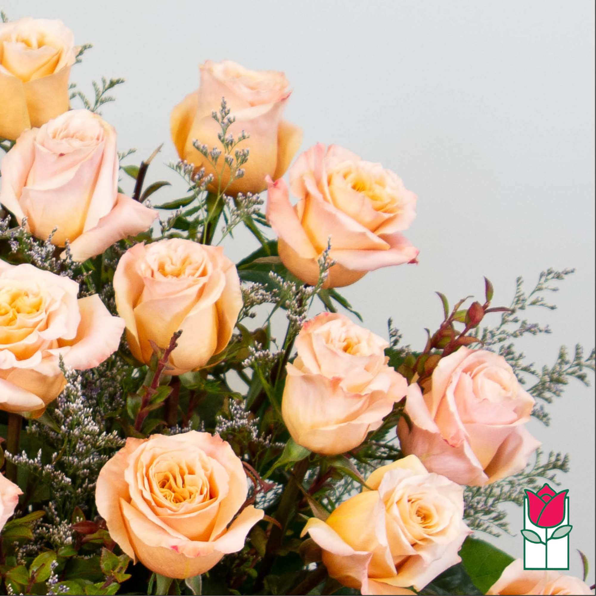 Bouquet of peach roses with small filler flowers, photo 4 of 5