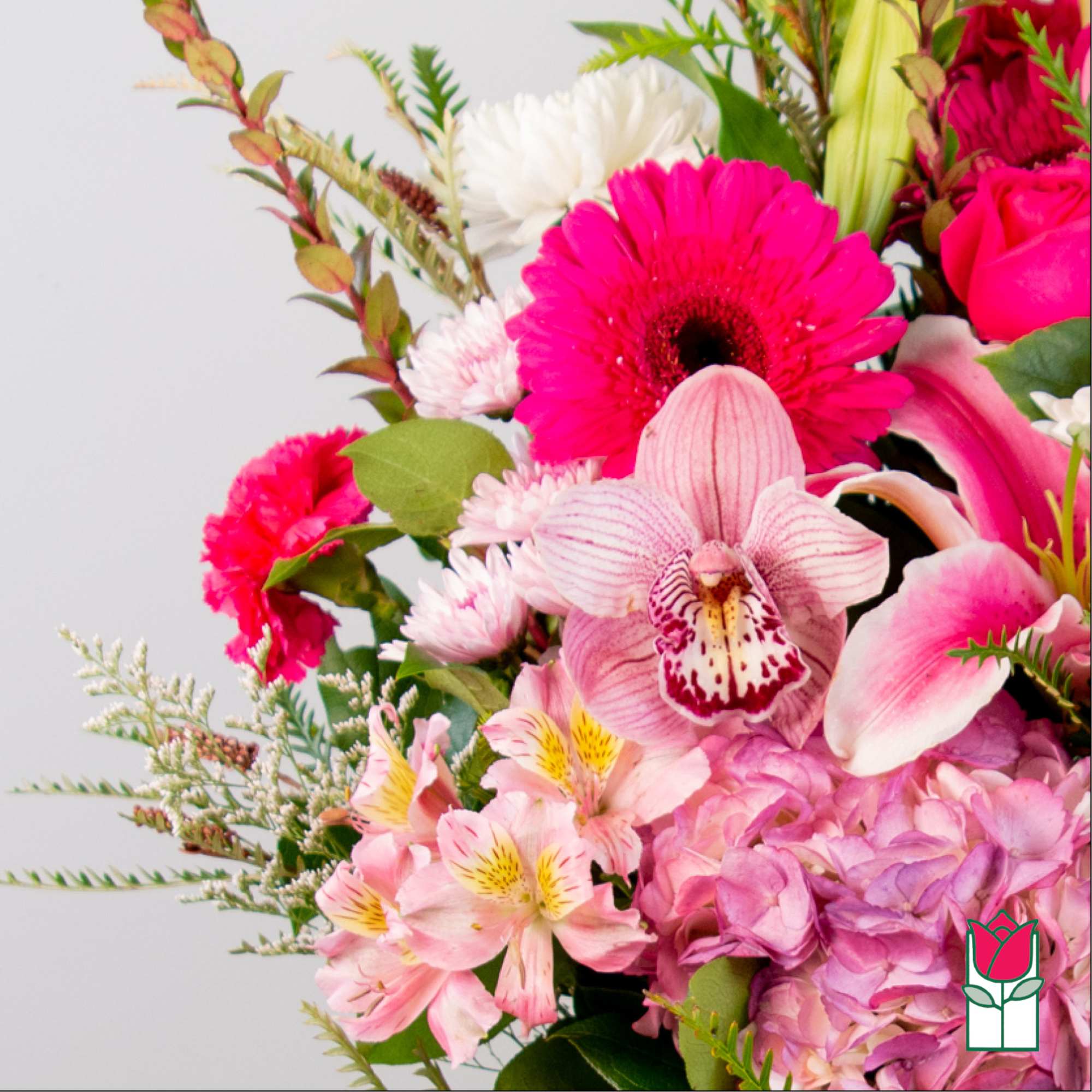 Pink and white mixed bouquet with orchids, gerbera daisies, and hydrangea