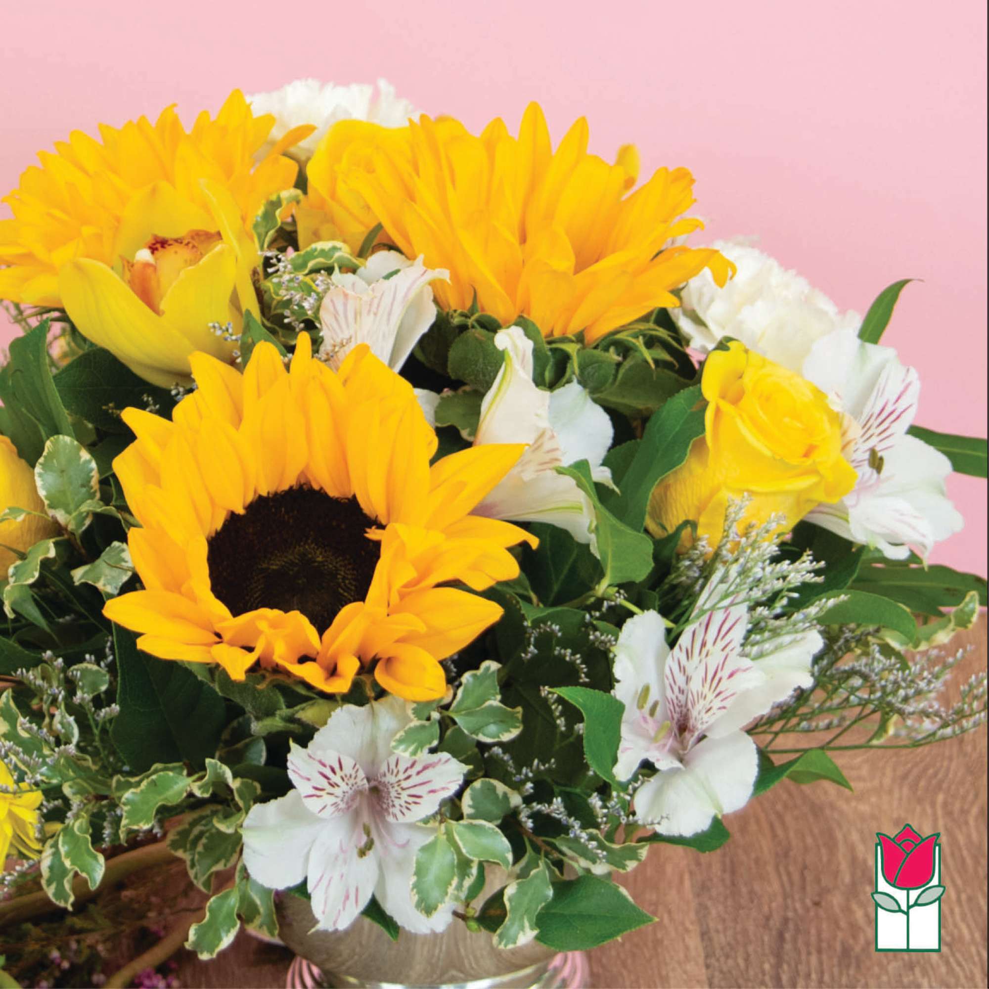 Yellow sunflowers and white flowers in a vase