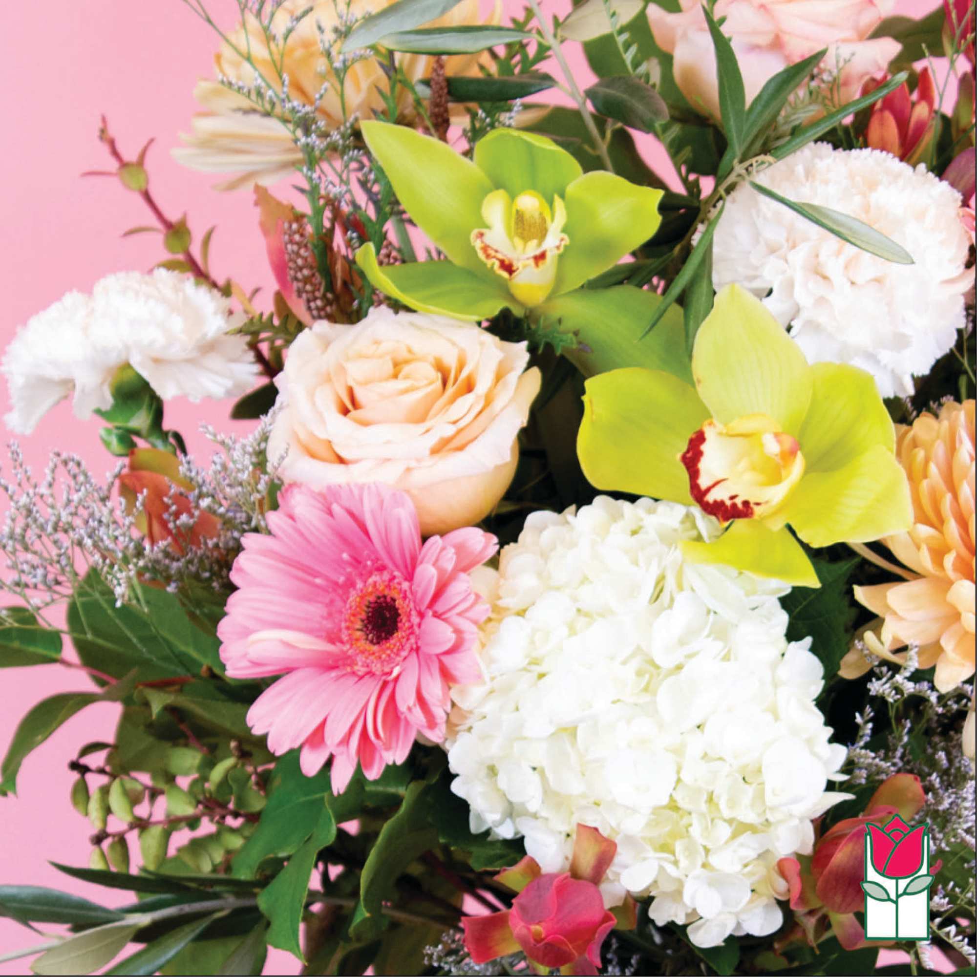 Mixed bouquet with pink gerbera, white hydrangea, roses, and green orchids