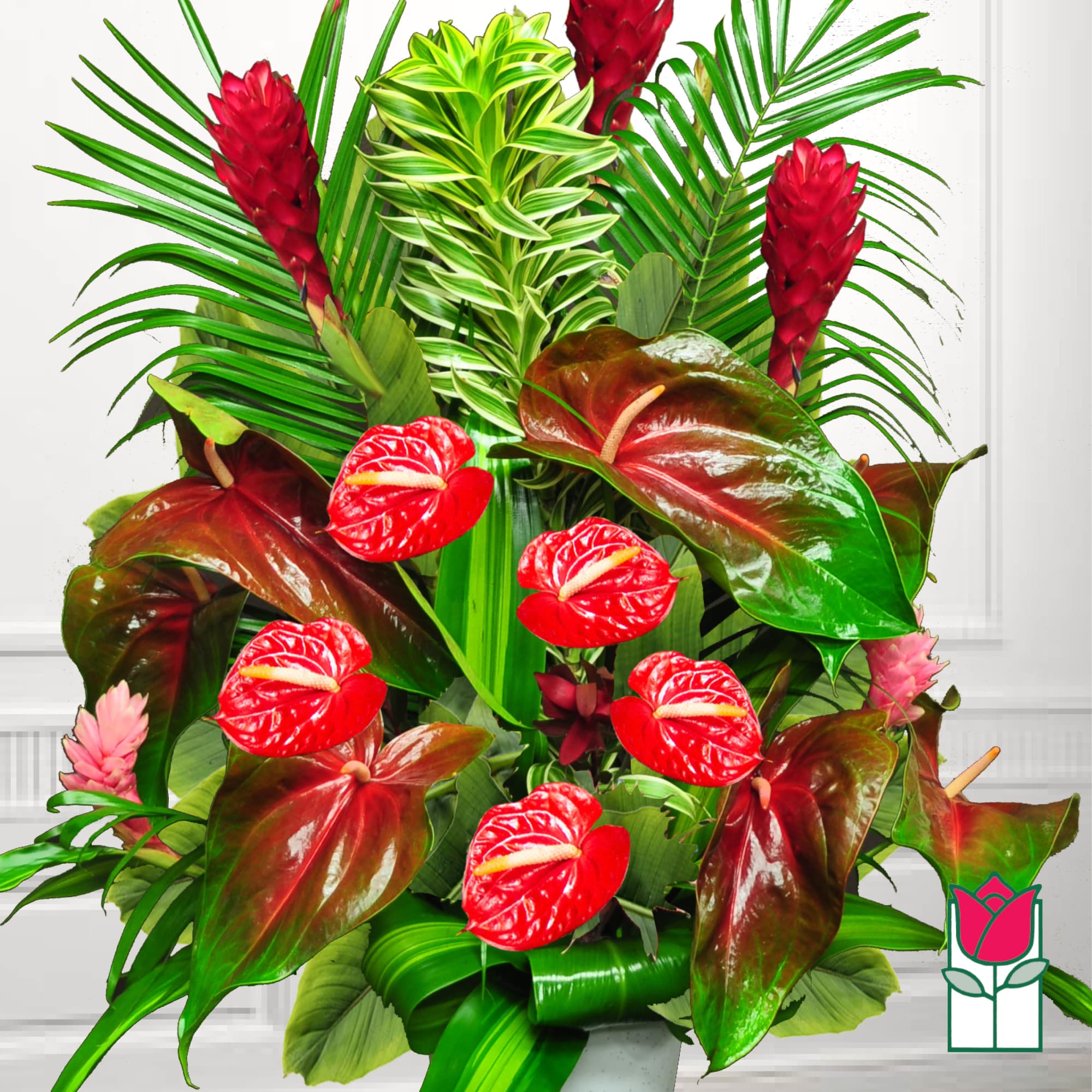Tropical arrangement with red anthuriums and red ginger flowers