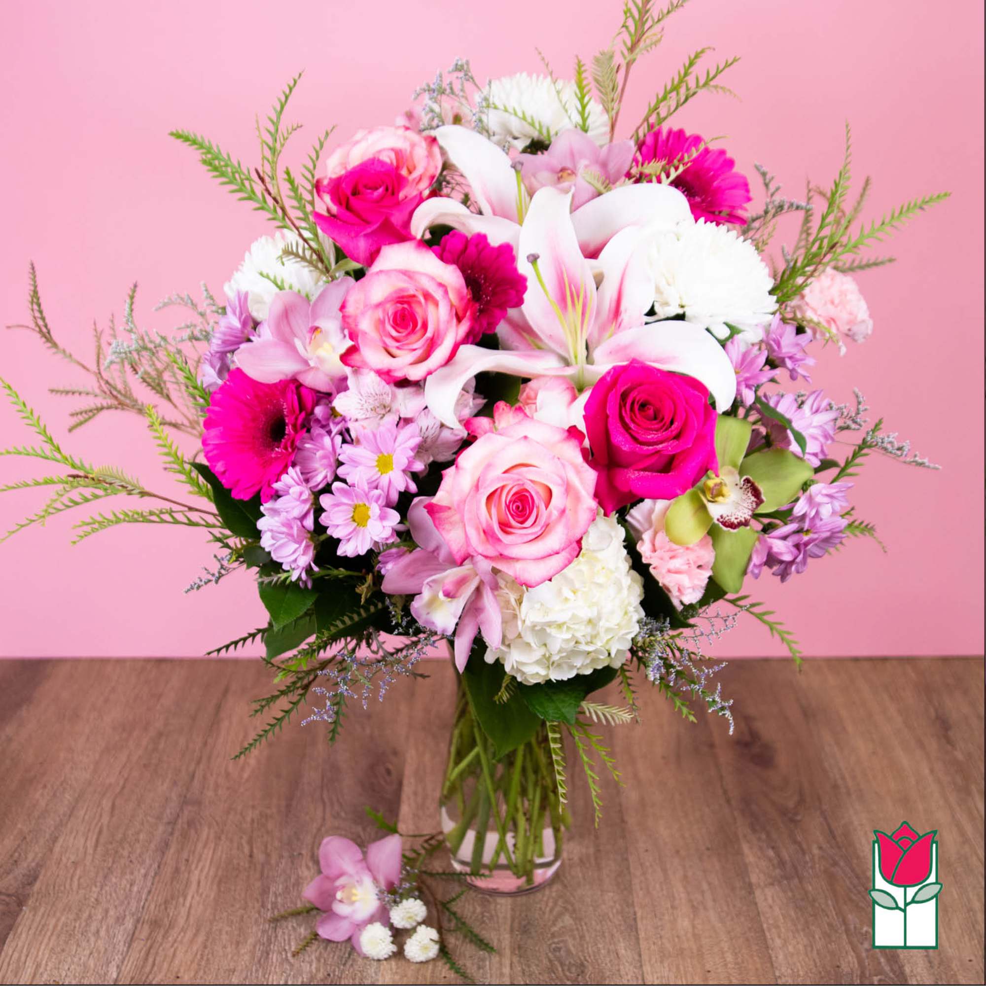 Pink and white mixed bouquet in a clear glass vase