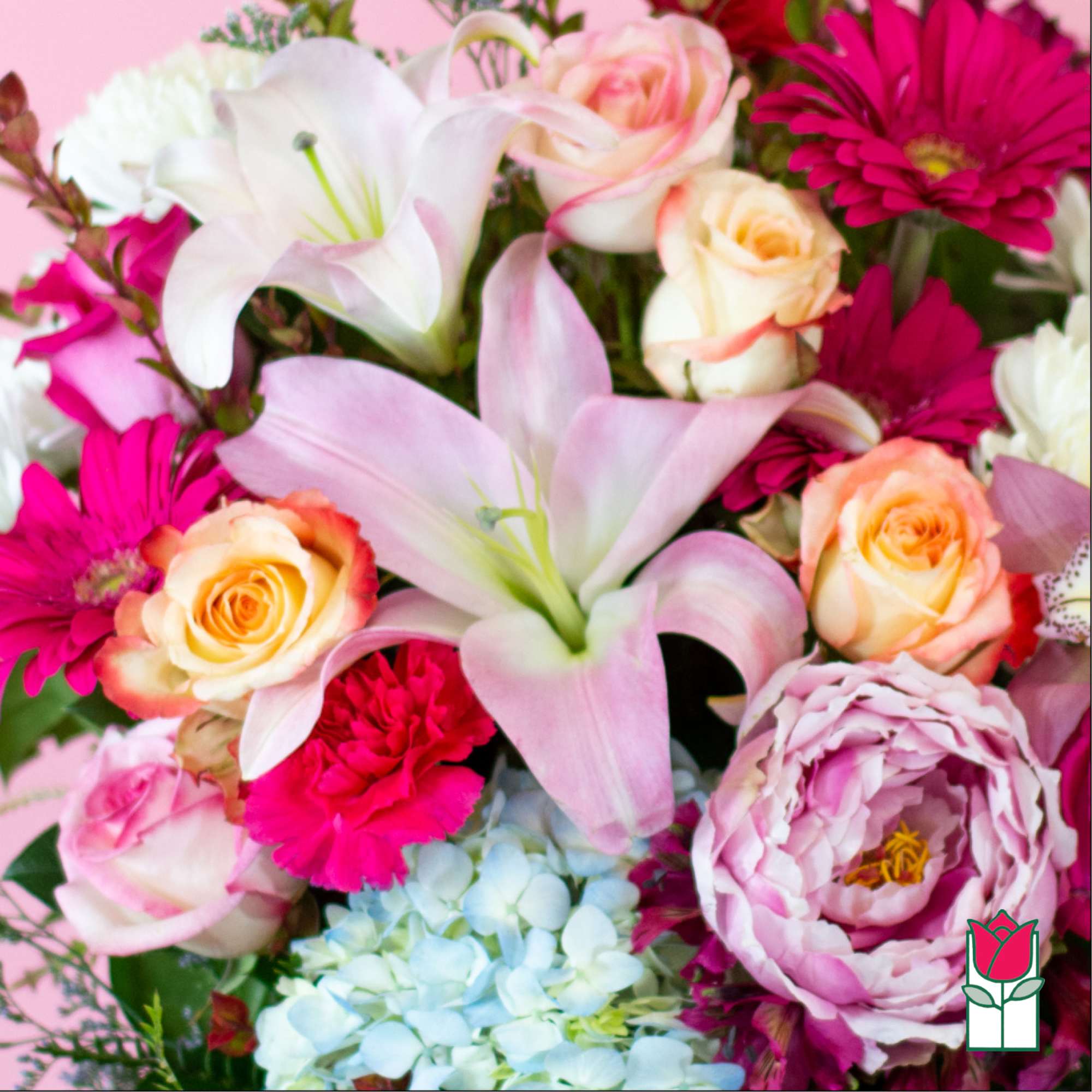 Pink and white bouquet with lilies, roses, and daisies