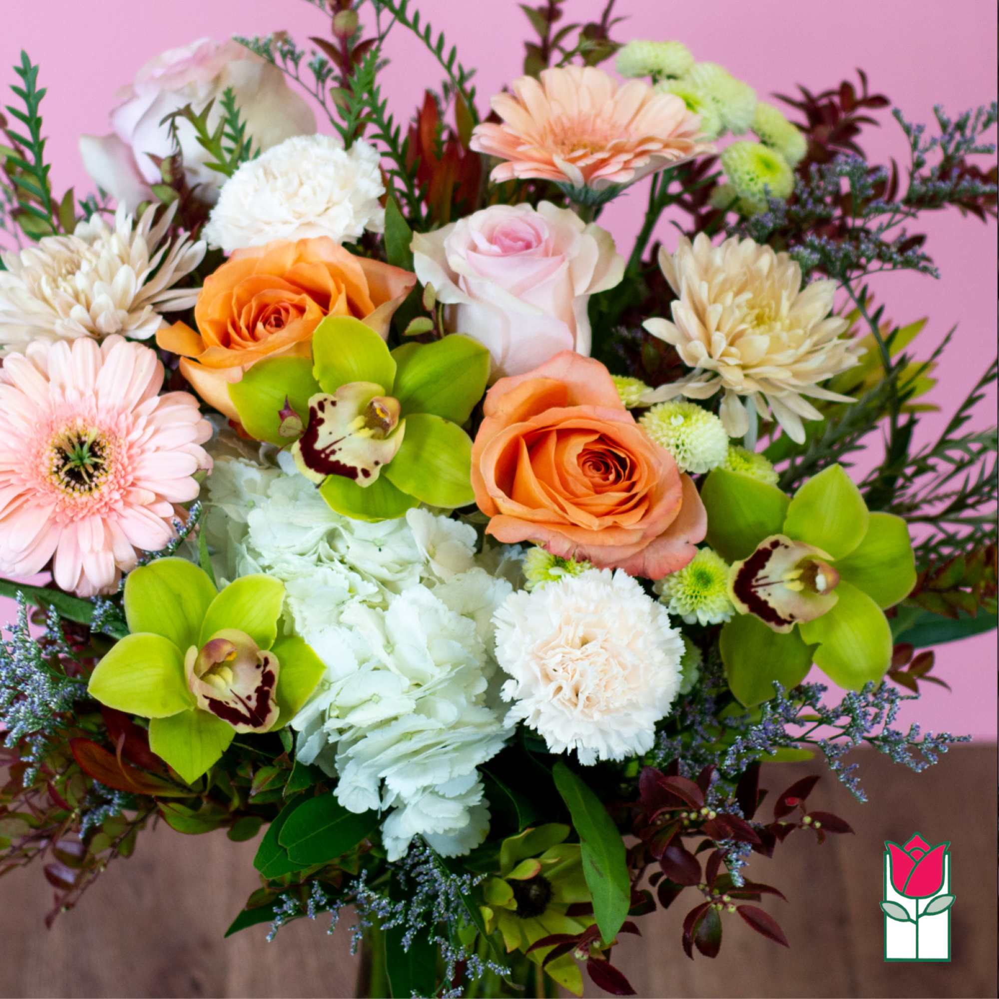 Mixed bouquet with roses, orchids, chrysanthemums, and gerbera daisies
