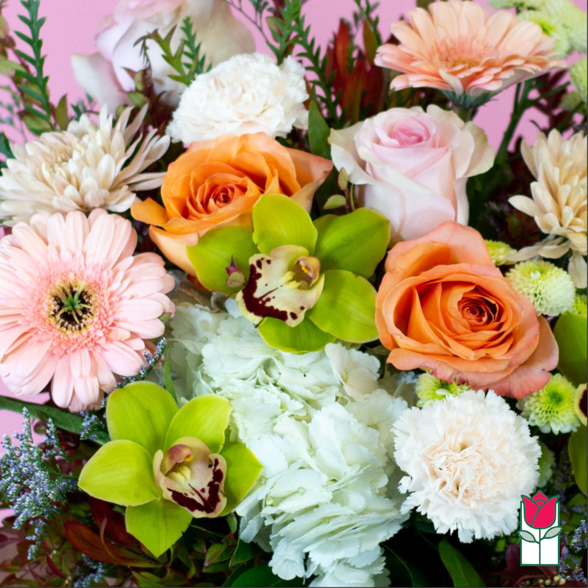 Mixed bouquet with orange and pink roses, gerbera daisies, and white blooms