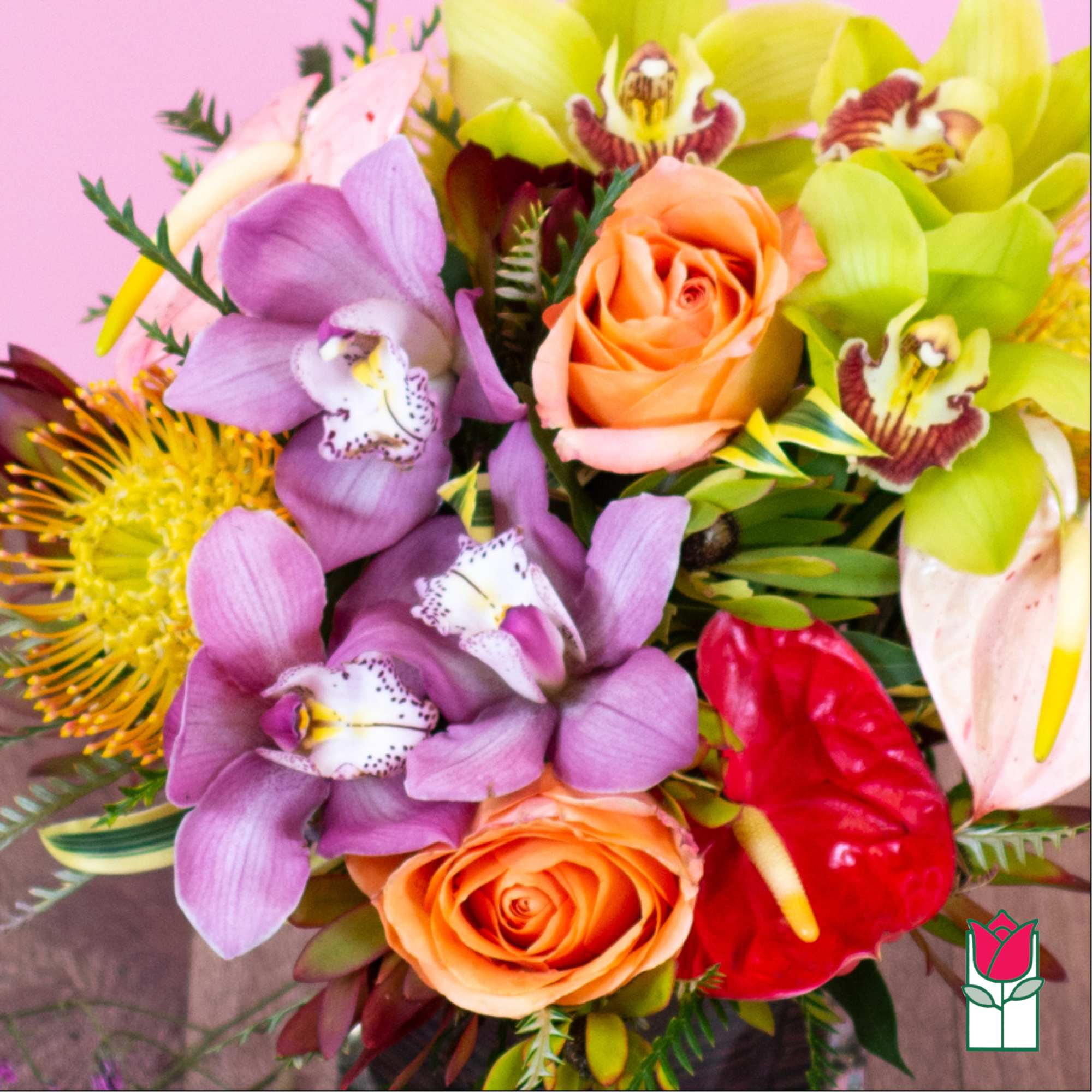 Bouquet of orchids, roses, and anthurium in bright mixed colors