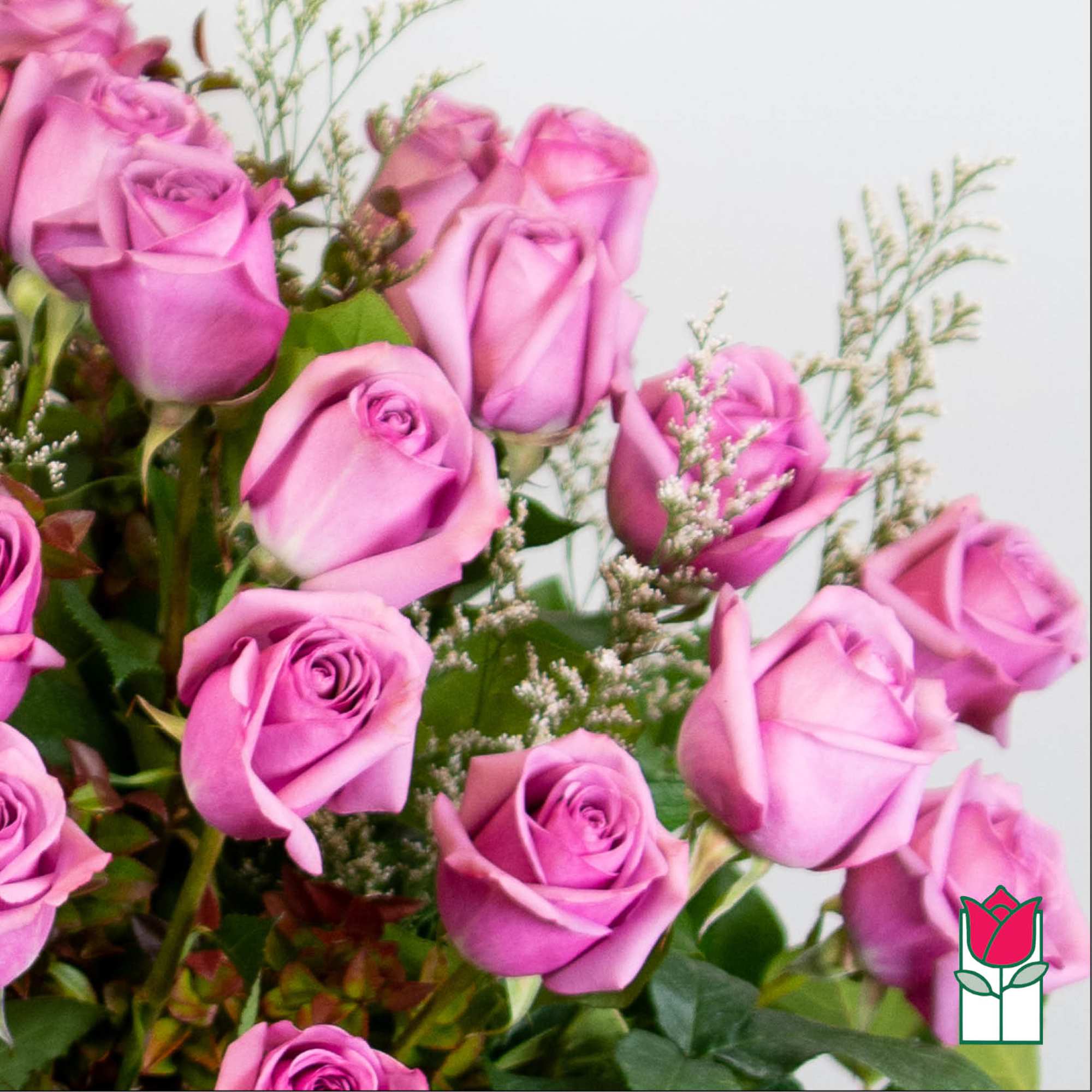 Bouquet of pink roses with small filler flowers