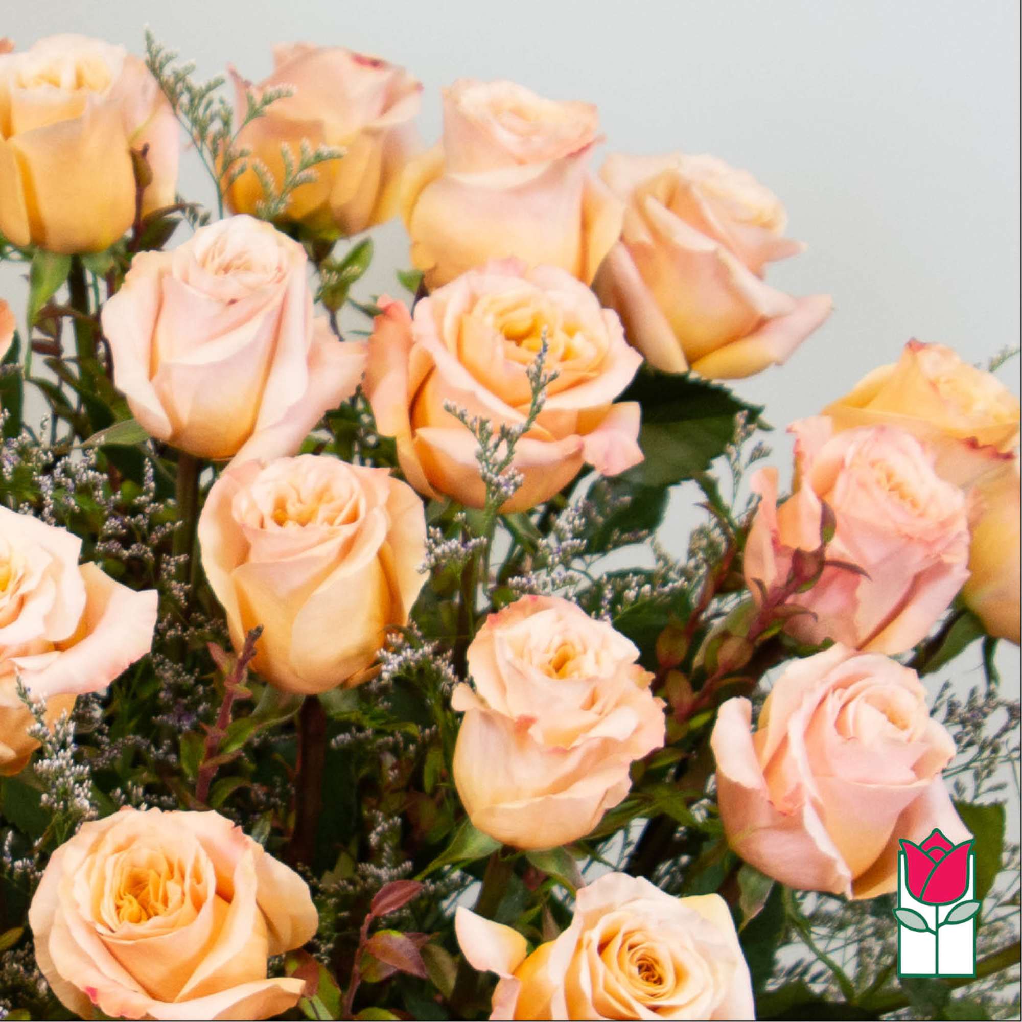 Bouquet of peach roses with small filler flowers, photo 4 of 5