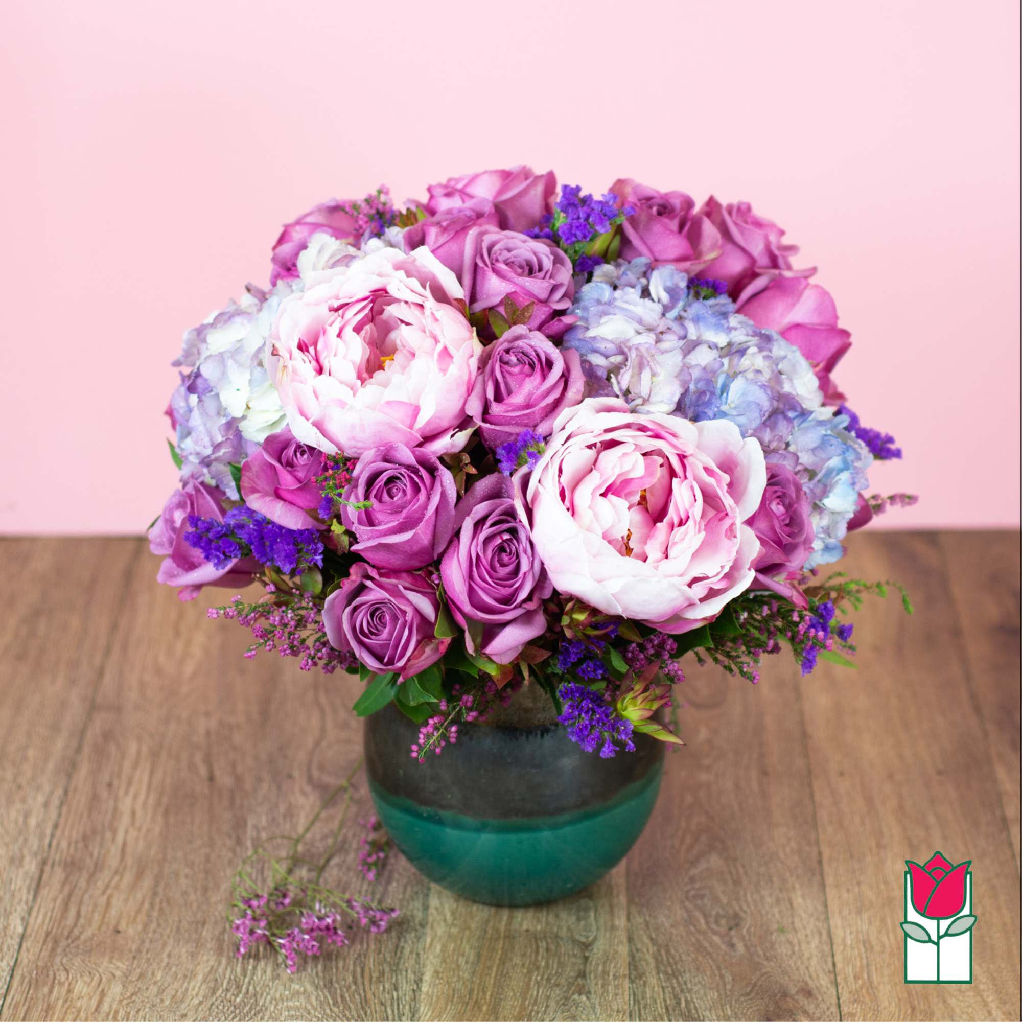 Pink and purple bouquet in a glass vase
